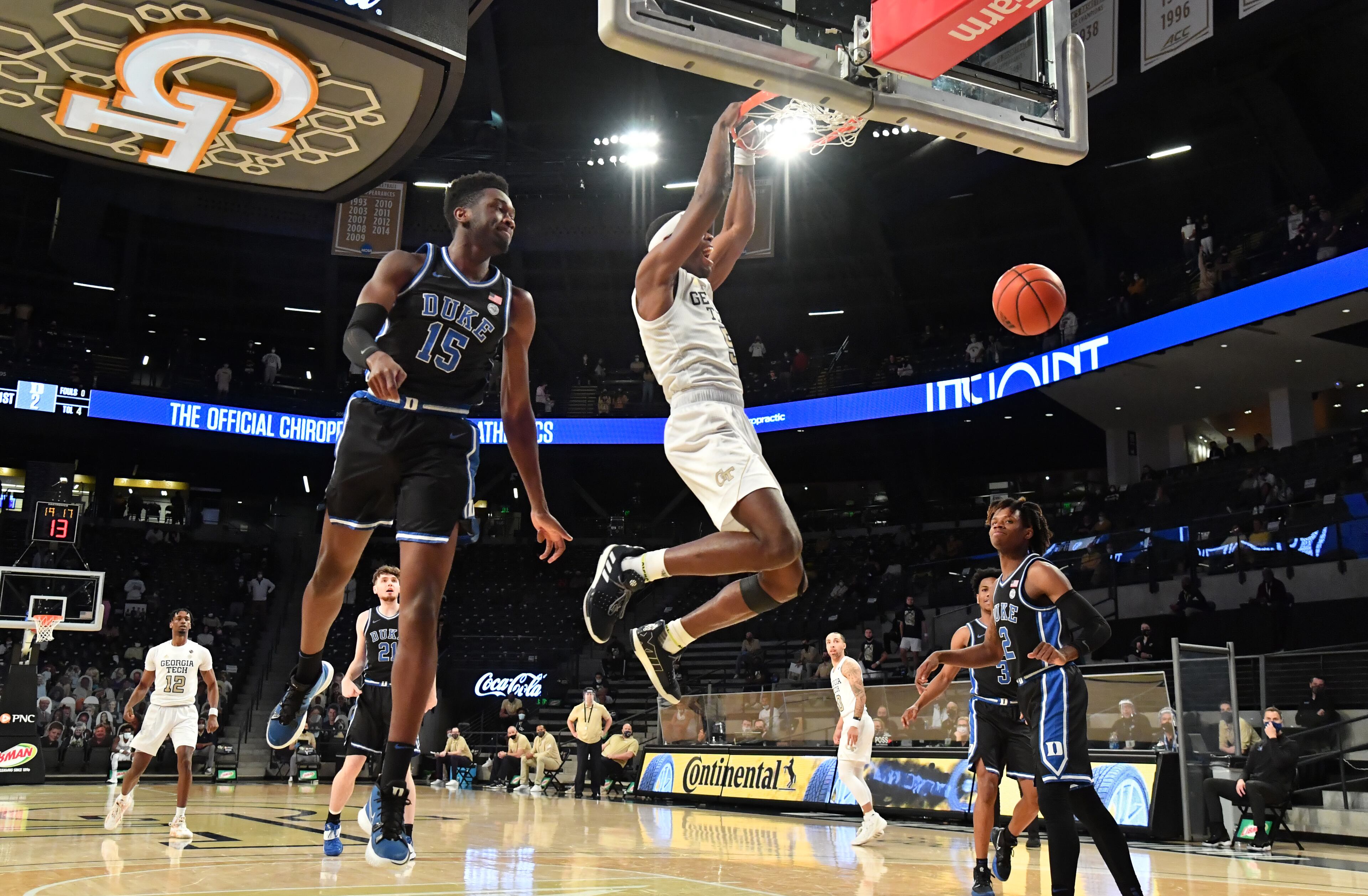 Georgia Tech's forward Moses Wright (5) hangs on the basket after dunking the ball in the first half of a NCAA college basketball game at Georgia Tech's McCamish Pavilion in Atlanta on Tuesday, March 2, 2021. (Hyosub Shin / Hyosub.Shin@ajc.com)