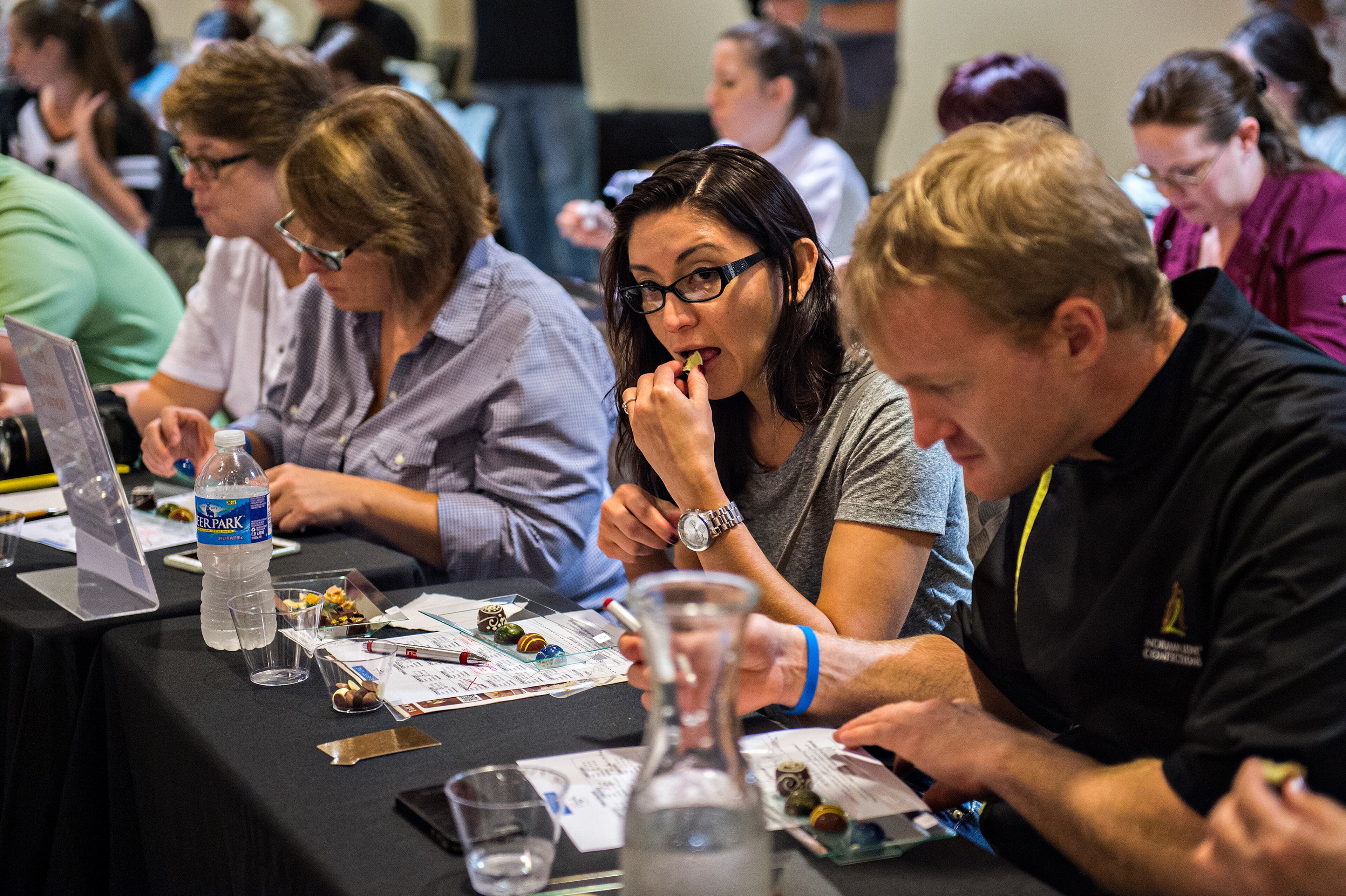August 23, 2015 Atlanta - Diana Leal (center) tastes one of the entries in the Chocolatier of the Year competition during Pastry Live 5 at 200 Peachtree in Atlanta on Sunday, August 23, 2015. Sunday marked the first of three days celebrating local and international pastry chefs with tastings, demonstrations and competitions. JONATHAN PHILLIPS / SPECIAL