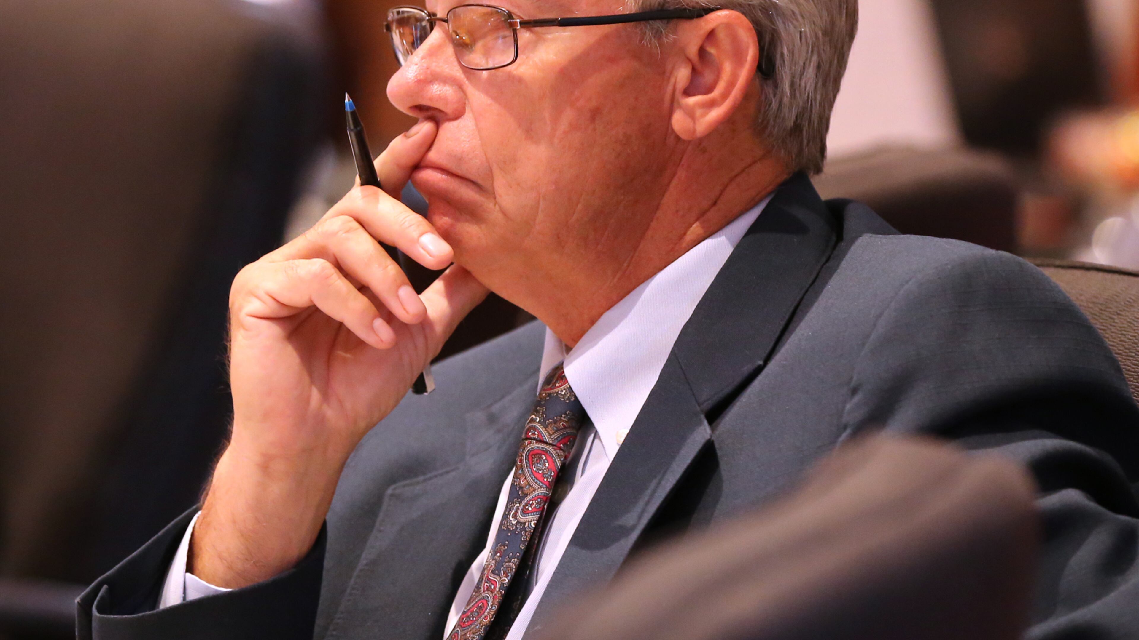 Newton County Commission Chairman Keith Ellis listens while residents speak out in opposition while holding two town hall meetings to discuss plans to build a mosque and cemetery in the county on Monday, August 22, 2016, in Covington. Curtis Compton /ccompton@ajc.com