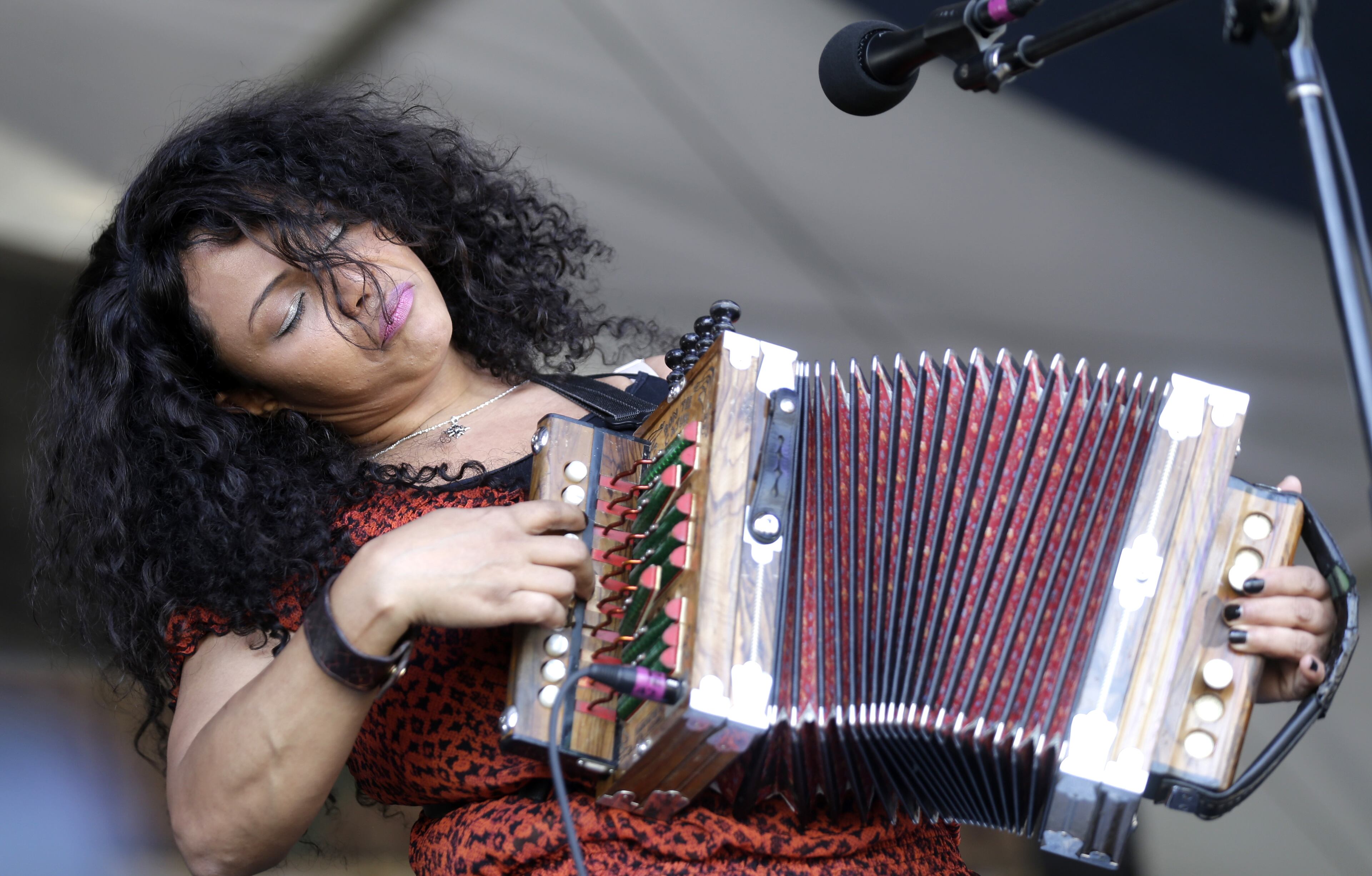 Rosie Ledette performs with her band 'Rosie Ledet & the Zydeco Playboys at the New Orleans Jazz and Heritage Festival in New Orleans, Friday, May 1, 2015. (AP Photo/Gerald Herbert)