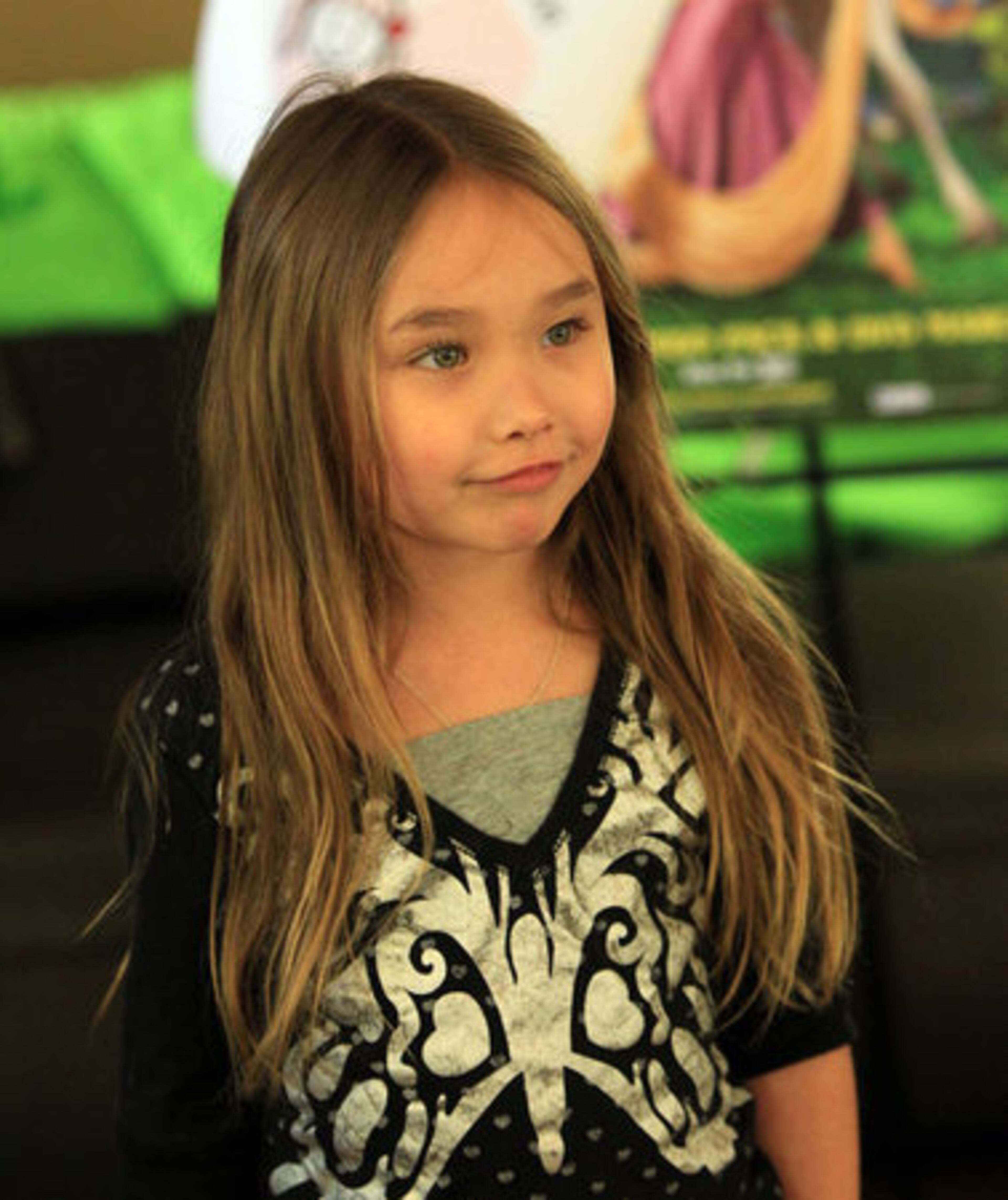 A brave young Sarah Yasine, 6, of Avondale, arrives for the Locks of Love charity event at Van Michael Salon in Buckhead, providing free haircuts to anyone who will donate their hair to the charity on Monday, March 28, 2011. Locks of Love charity provides hair pieces to financially disadvantaged children suffering from long-term medical hair loss.