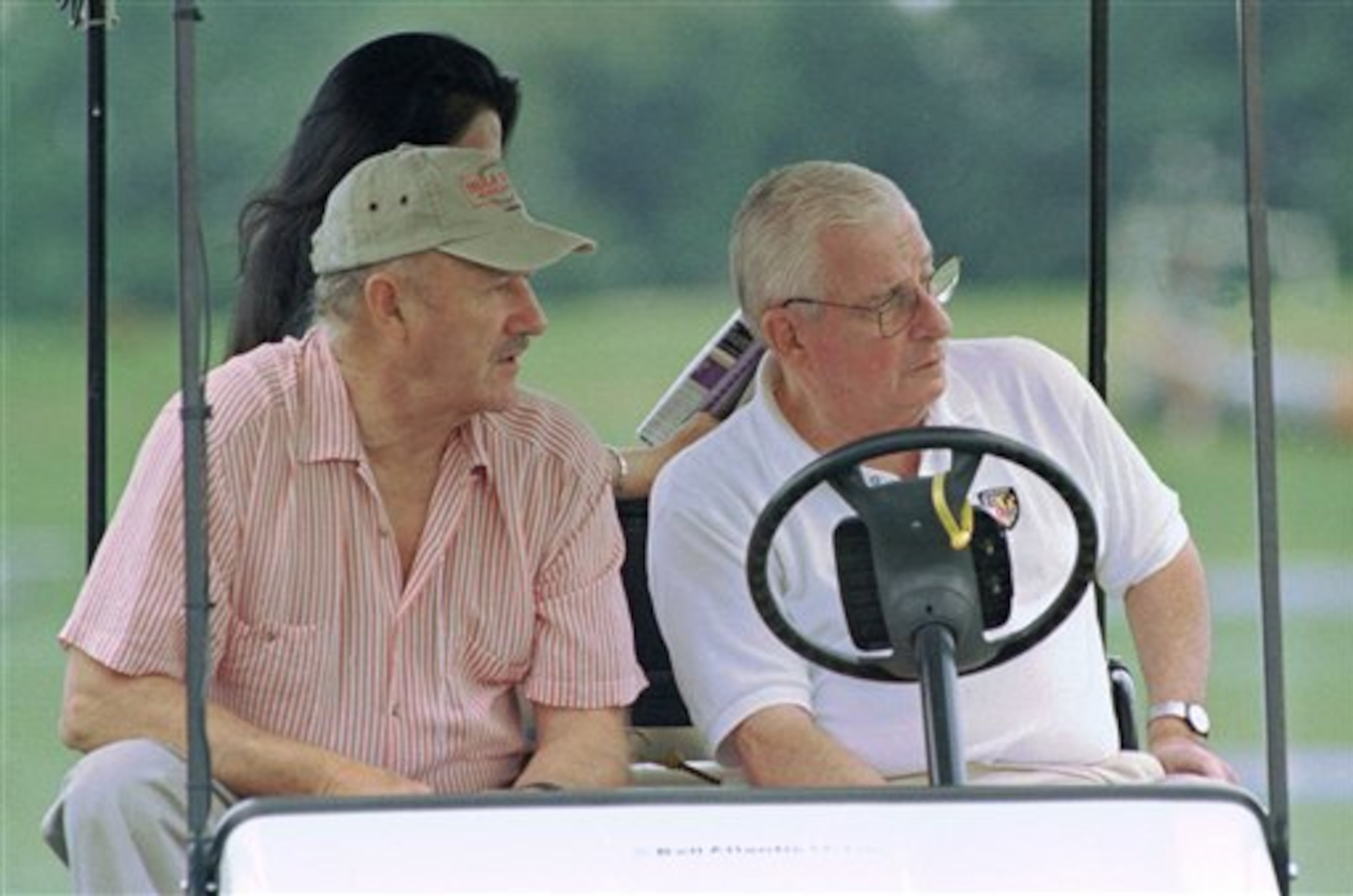 FILE - Actor Gene Hackman, left, watches the Baltimore Ravens' morning workout along with Ravens owner Art Modell on in this July 30, 1999 file photo taken at Westminster College in Westminster, Md. The Baltimore Ravens said Modell died early Thursday Sept. 6, 2012 at Johns Hopkins Hospital, where he had been admitted Wednesday. A cause of death was not given. (AP Photo/Dave Hammond, File)