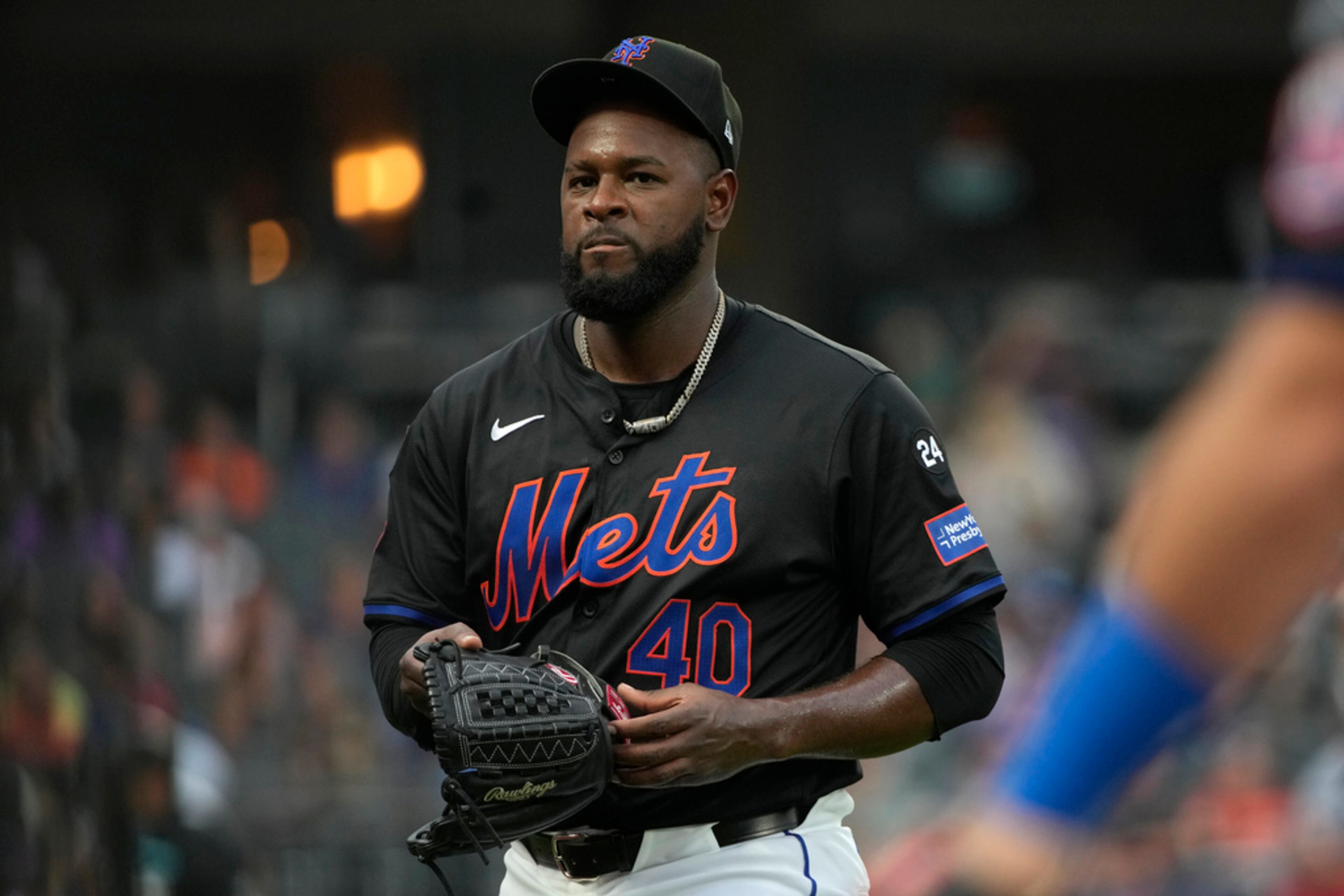 New York Mets pitcher Luis Severino walks to the dugout during the first inning of a baseball game against the Atlanta Braves, Thursday, July 25, 2024, in New York. (AP Photo/Pamela Smith)