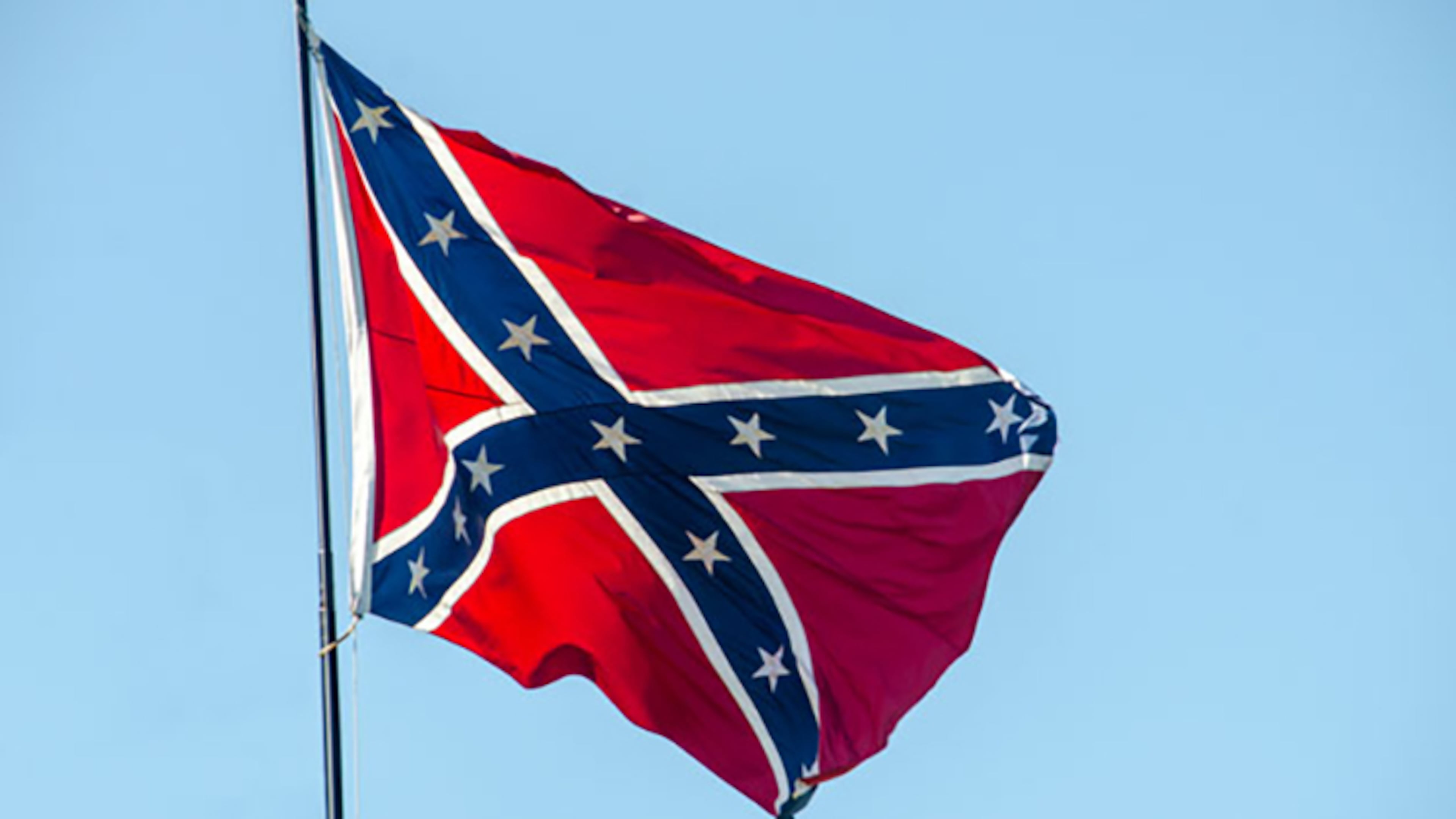 Students at West Plains High School in Missouri hoisted the Confederate battle flag in their school lunchroom in response to classmates who handed out rainbow pride flags in support of LGBTQ rights.