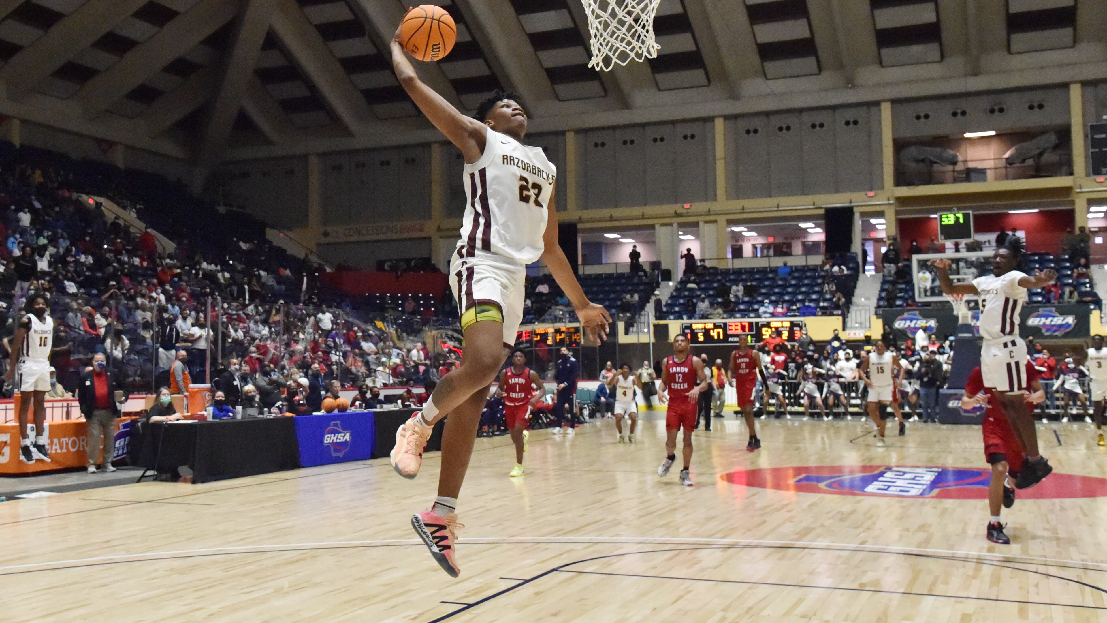 March 12, 2021 Macon - Cross Creek's Antoine Lorick (23) dunks the ball during the 2021 GHSA State Basketball Class AAA Boys Championship game at the Macon Centreplex in Macon on Friday, March 12, 2021 Cross Creek won 57-49 over Sandy Creek. (Hyosub Shin / Hyosub.Shin@ajc.com)