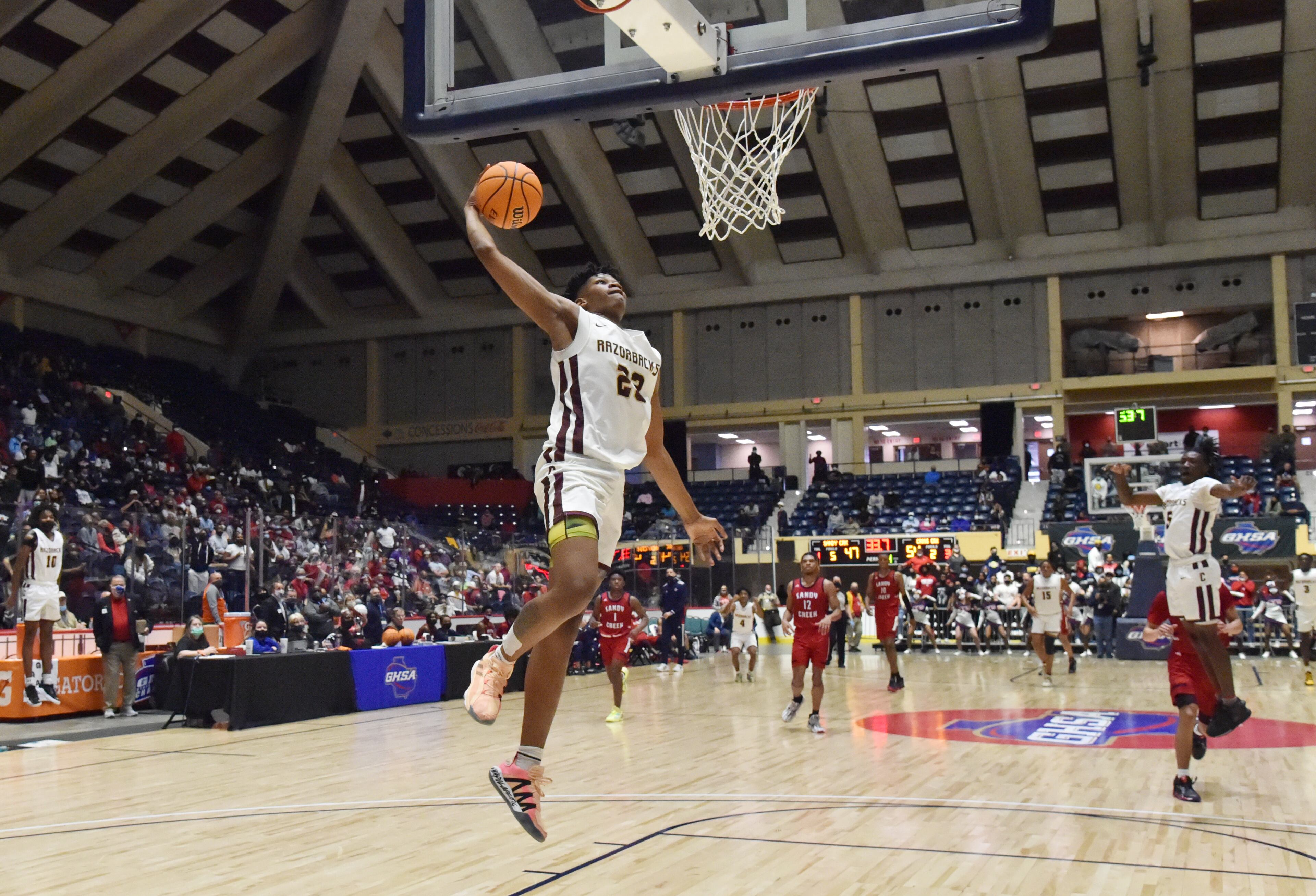 March 12, 2021 Macon - Cross Creek's Antoine Lorick (23) dunks the ball during the 2021 GHSA State Basketball Class AAA Boys Championship game at the Macon Centreplex in Macon on Friday, March 12, 2021 Cross Creek won 57-49 over Sandy Creek. (Hyosub Shin / Hyosub.Shin@ajc.com)