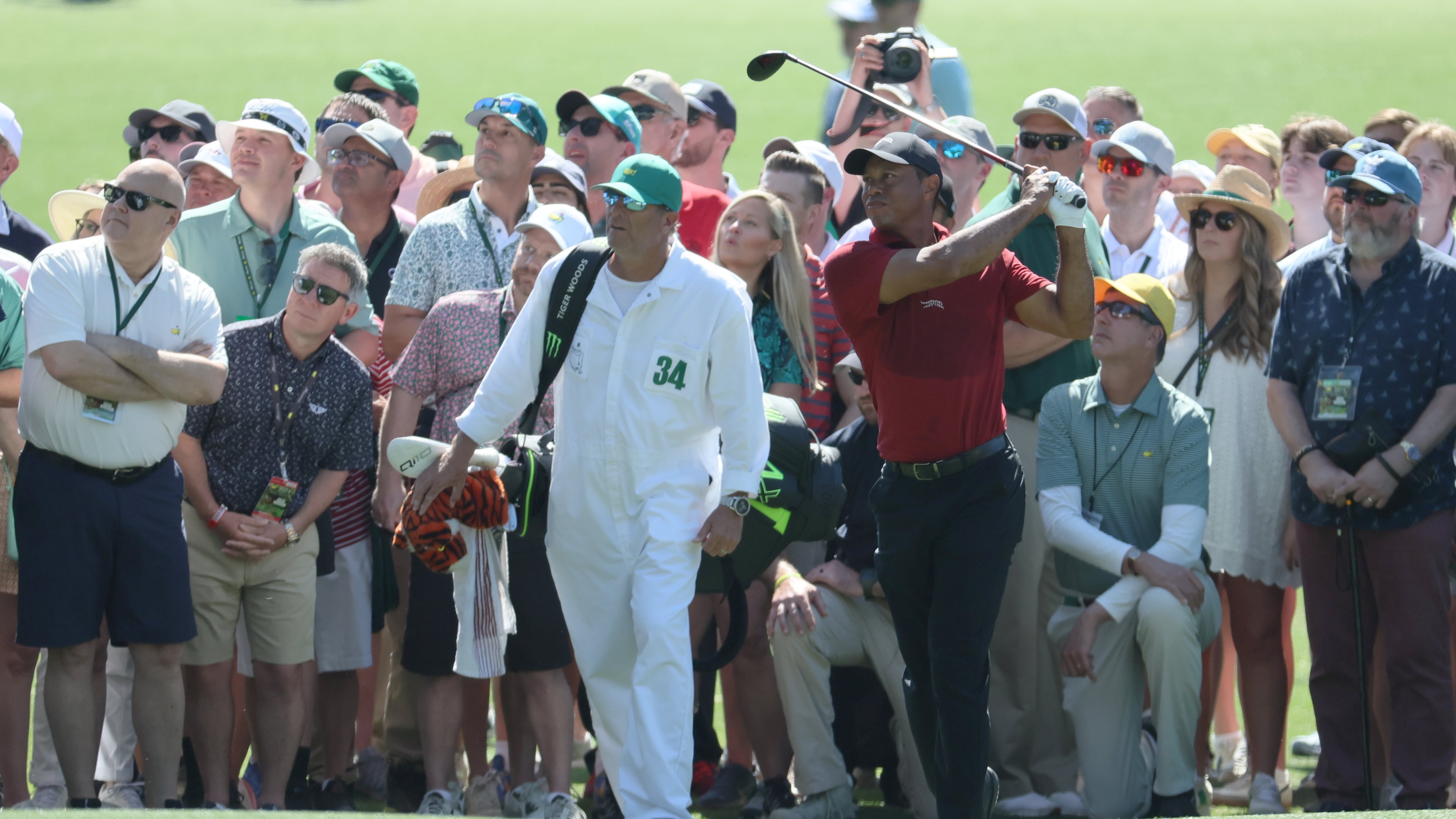 Tiger Woods hits his second shot on eighth hole during the final round of the 2024 Masters Tournament at Augusta National Golf Club, Sunday, April 14, 2024, in Augusta, Ga. (Jason Getz/AJC)