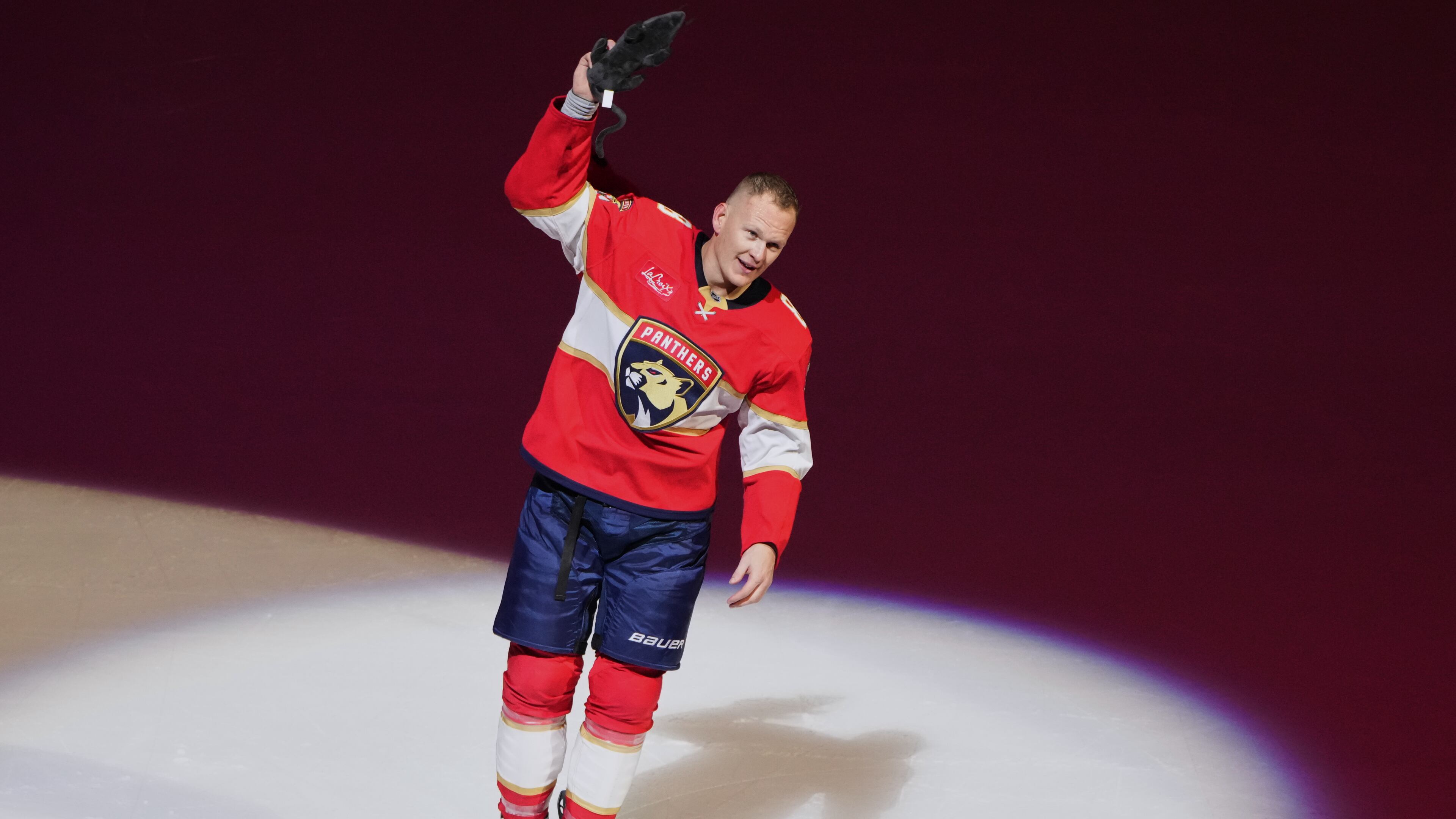 Florida Panthers left wing Brady Tkachuk acknowledges the crowd after scoring a game winning goal during overtime in an NHL hockey game against the Vancouver Canucks, Thursday, Oct. 15, 2026, in Sunrise, Fla. (AP Photo/Lynne Sladky)