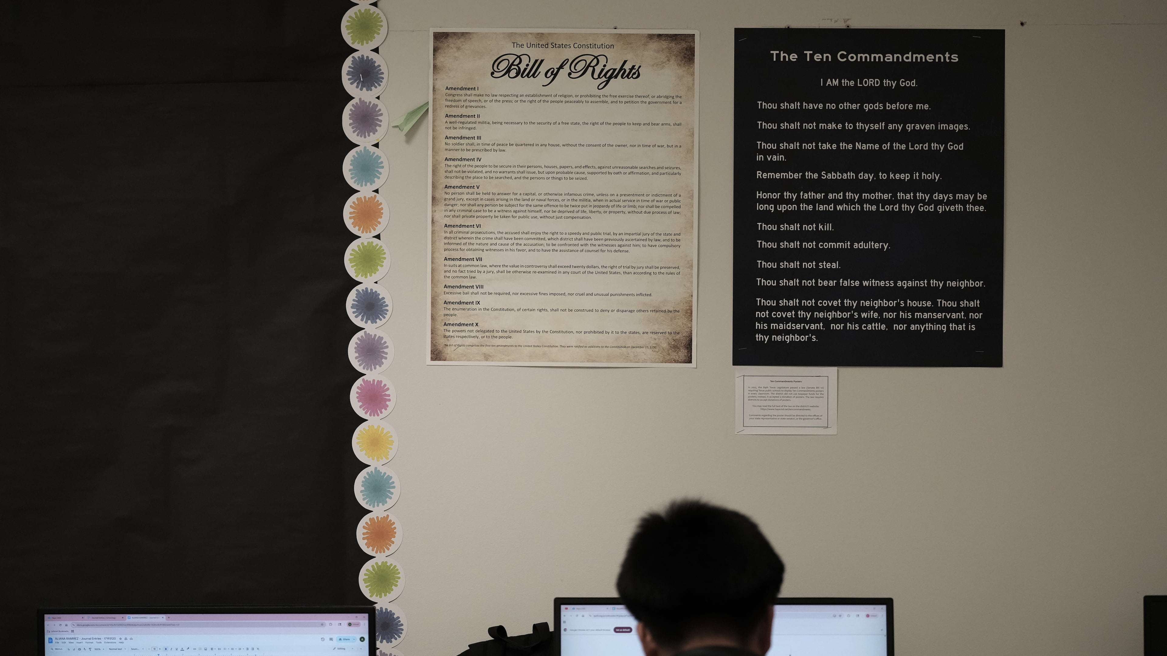 FILE - Students work under Ten Commandments and Bill of Rights posters on display in a classroom at Lehman High School in Kyle, Texas, Thursday, Oct. 16, 2025. (AP Photo/Eric Gay,File)