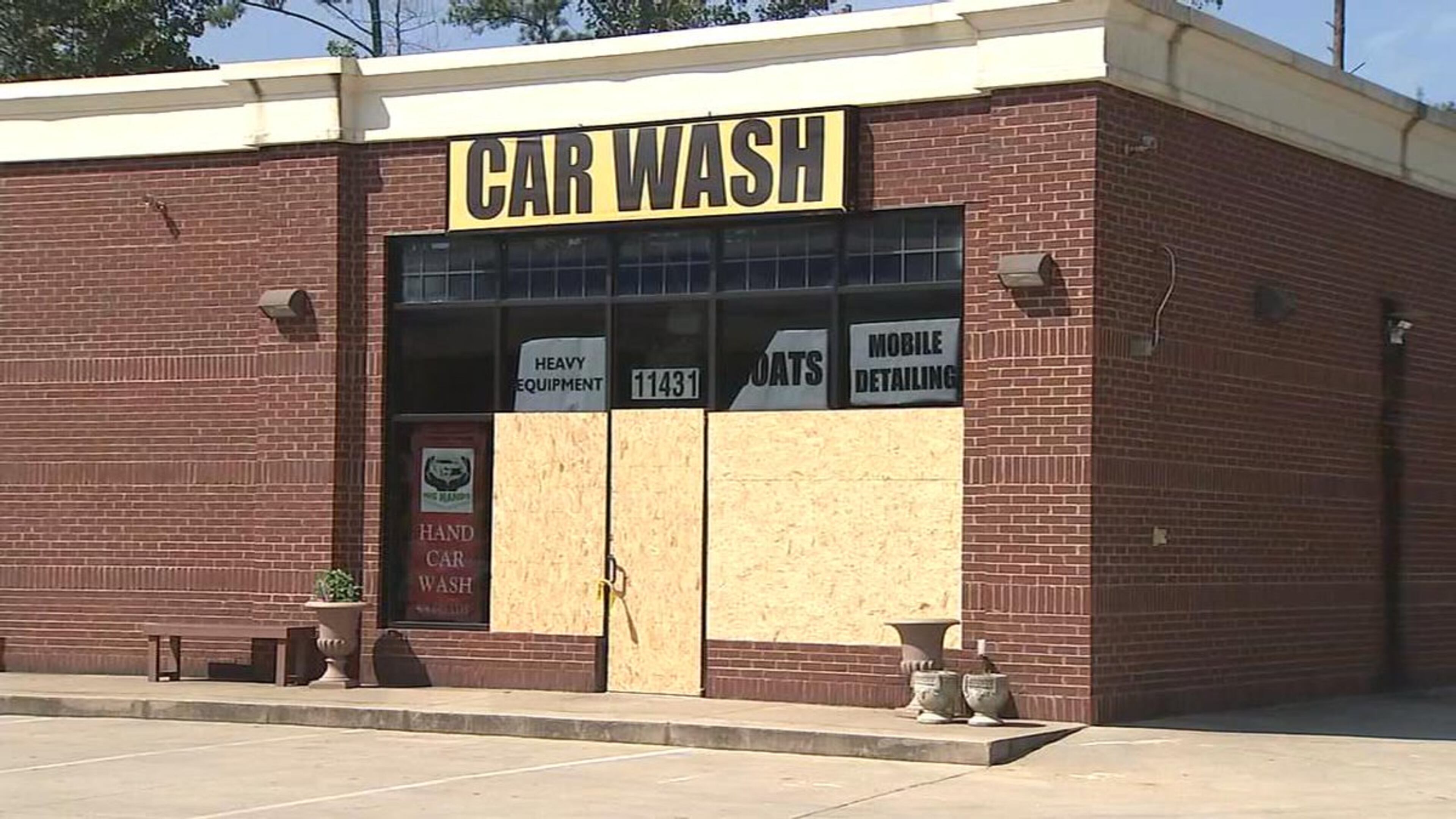 Windows were shot out of this car wash in Cherokee County. (Credit: Channel 2 Action News)