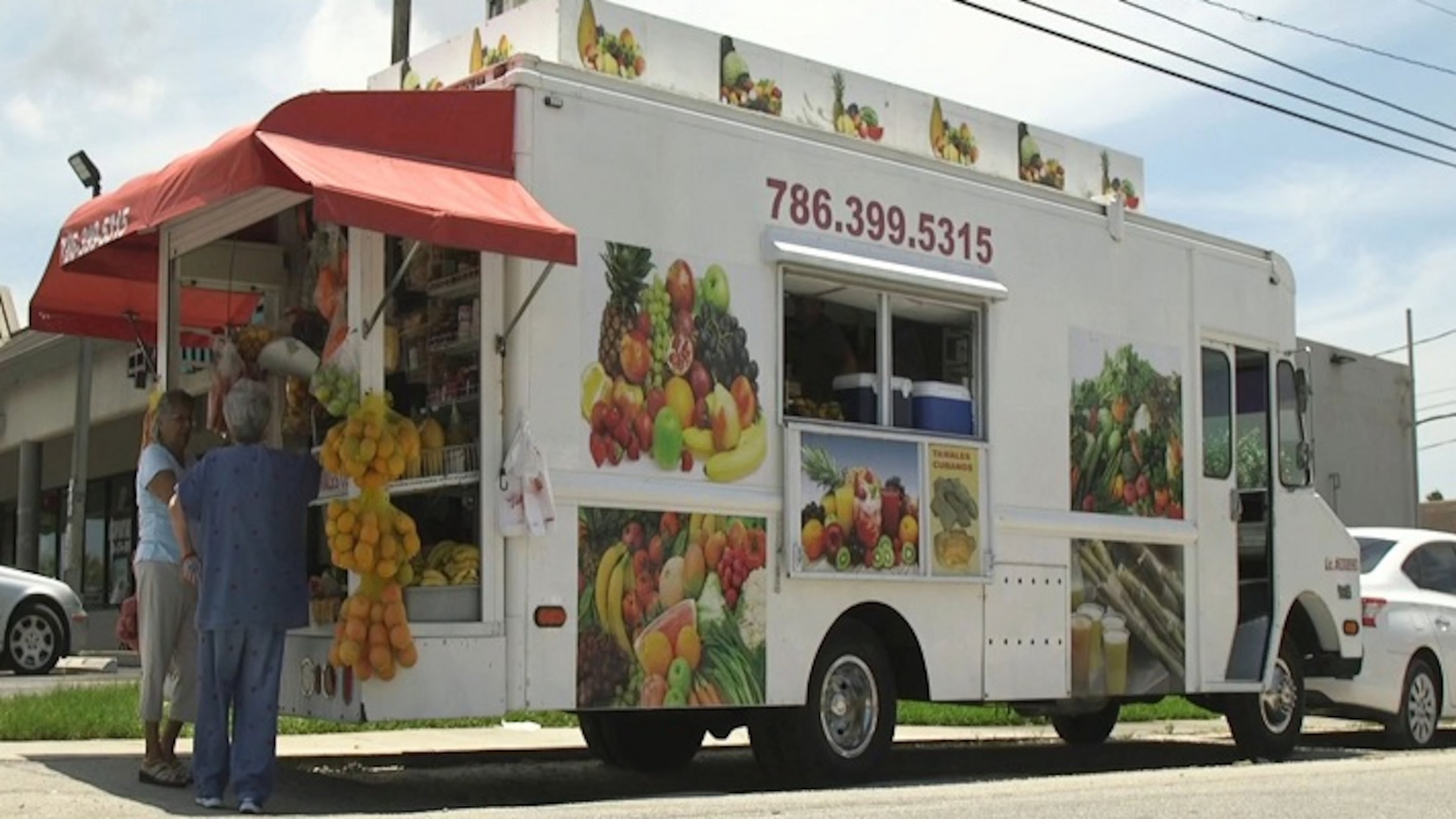 A bodega truck sits outside a shopping plaza where people can shop for produce and other cooking essentials on June 20, 2018 in Miami. (Daniel A. Varela/Miami Herald/TNS)