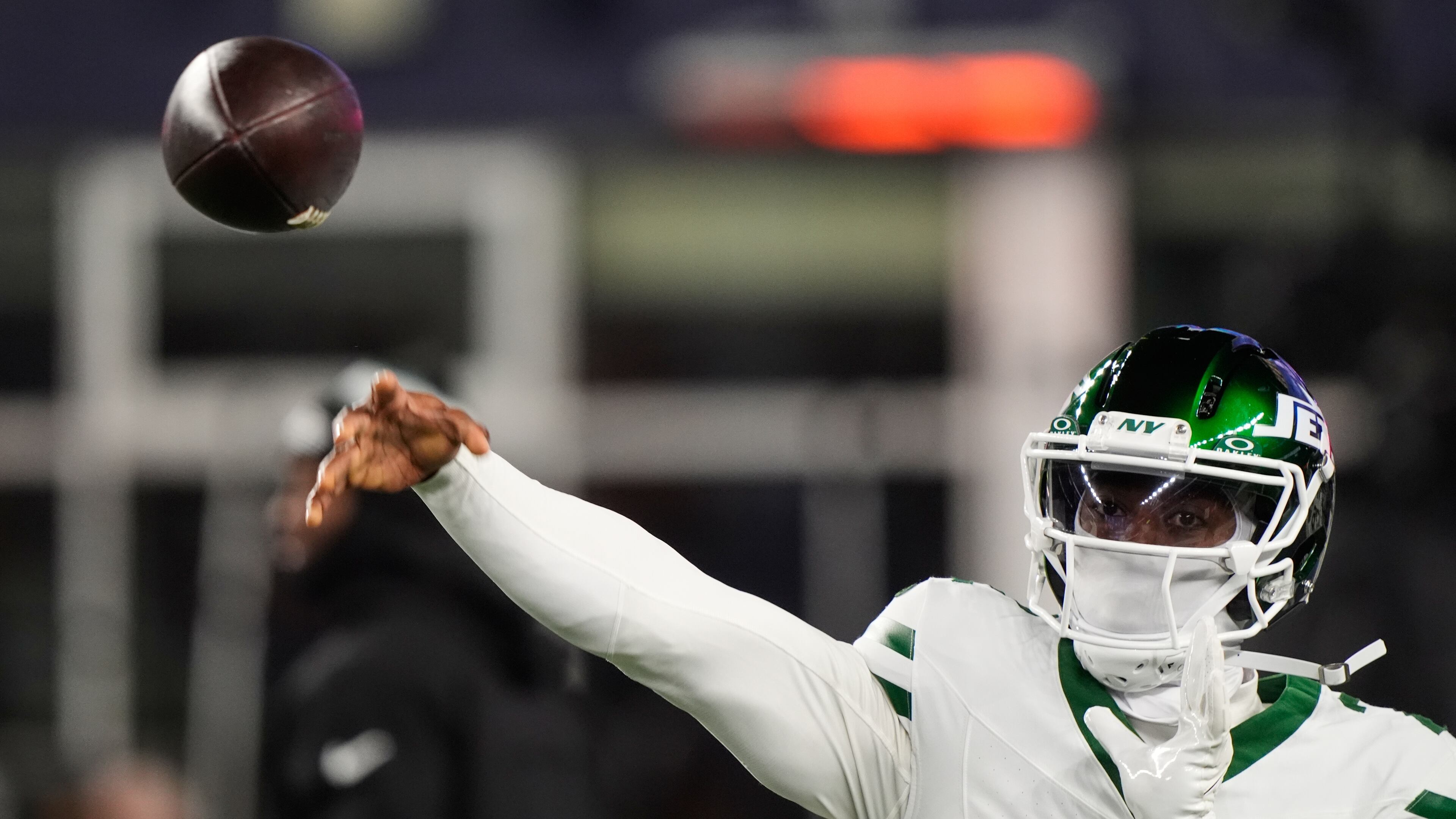 The Jets' Tyrod Taylor — pictured warming up up earlier this month before the team's game against the Patriots — is 60-of-97 for 601 yards with four touchdowns, four interceptions and 12 sacks taken this season. (Robert F. Bukaty/AP)