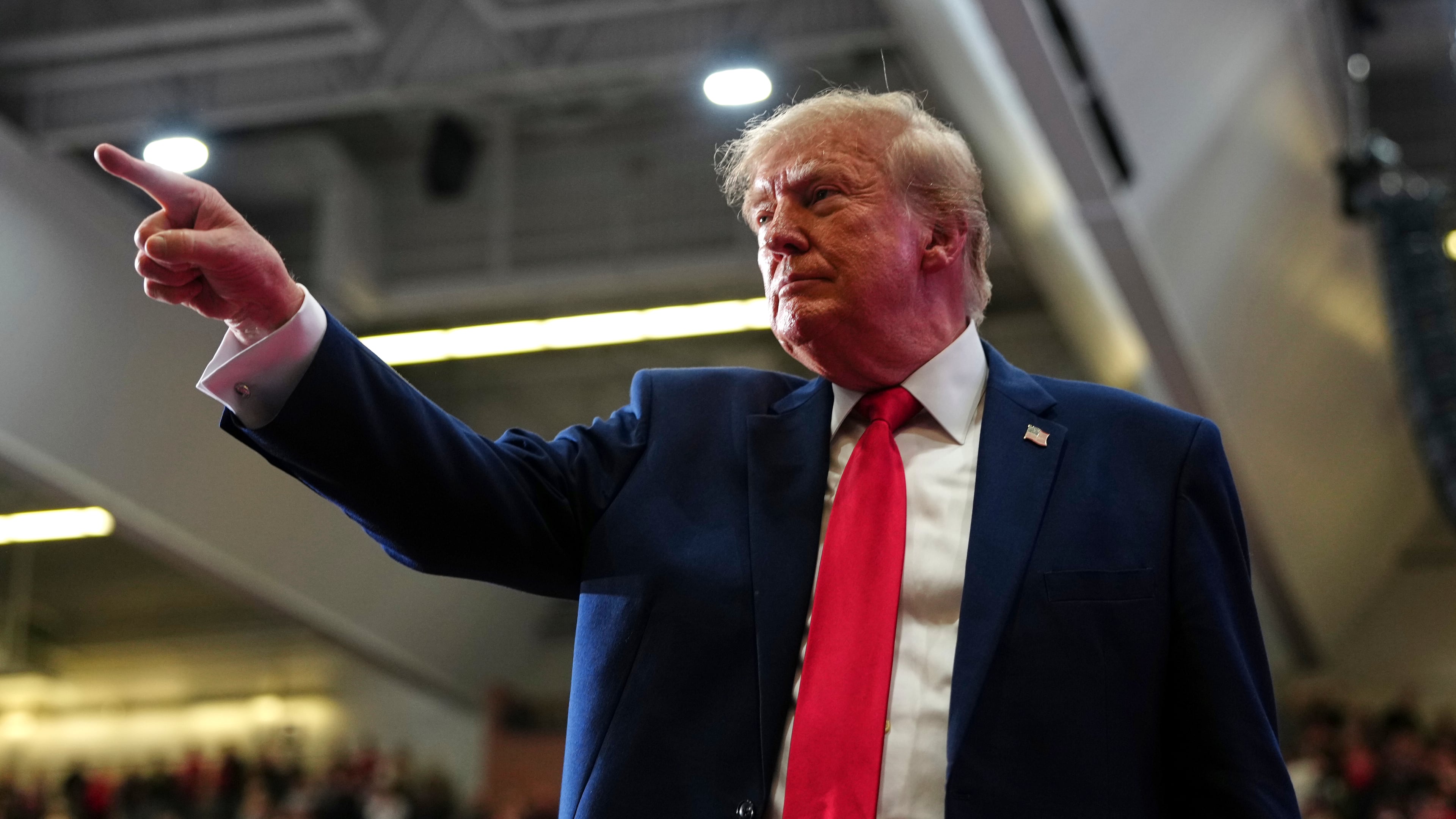 President Donald Trump departs after speaking during a campaign rally at McMorran Place Sports and Entertainment Center, Sunday, Oct. 25, 2026, in Port Huron, Mich. (AP Photo/Julia Demaree Nikhinson)