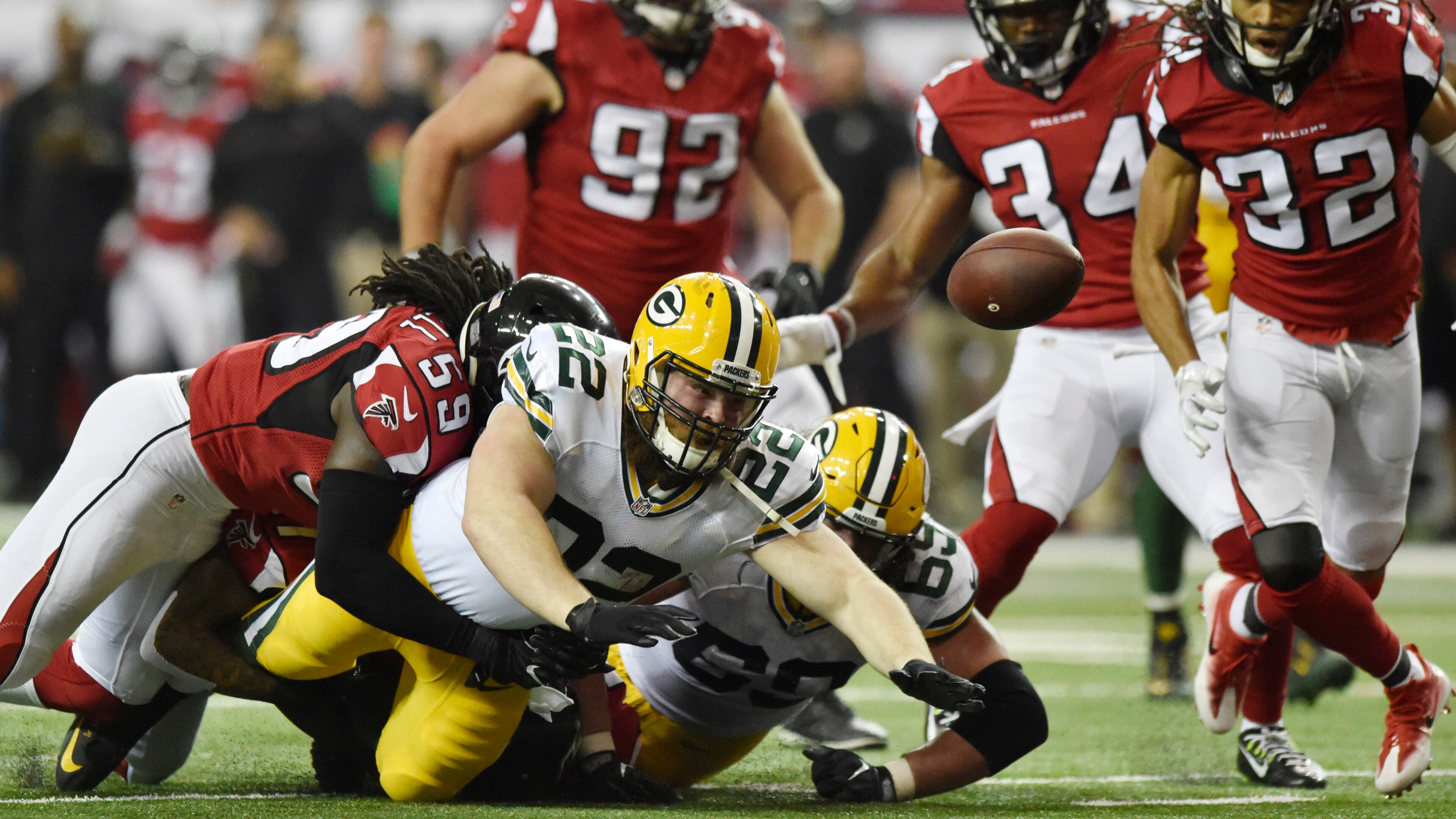 January 22, 2017, Atlanta - Packers fullback Aaron Ripkowski (22) fumbles the ball during the NFC Championship game against the Packers in Atlanta, Georgia, on Sunday, January 22, 2017. (DAVID BARNES / DAVID.BARNES@AJC.COM)