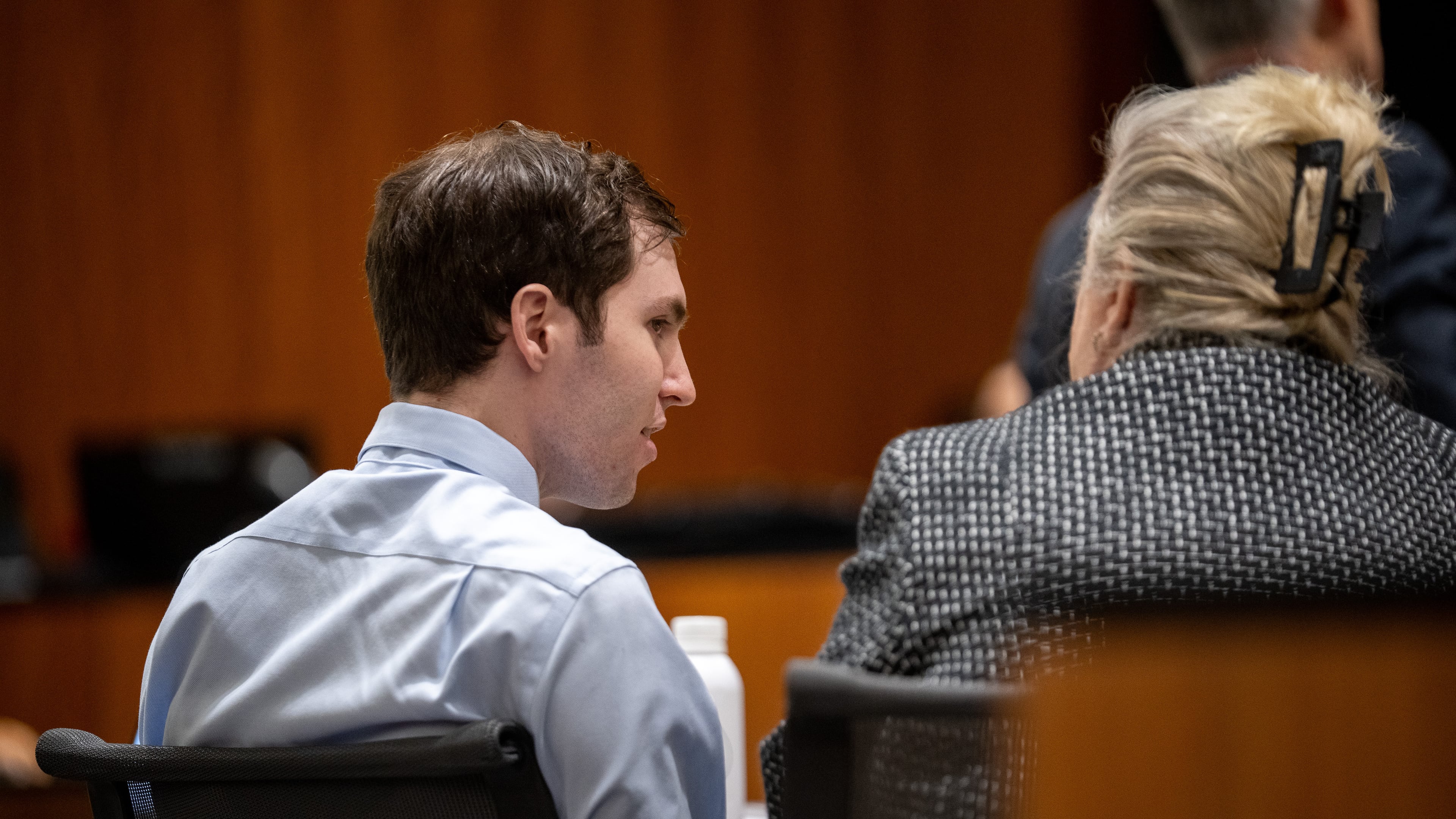 Tyler Robinson, left, speaks with his attorney Kathryn Nester in 4th District Court in Provo, Utah, on Friday, April 17, 2026. (Trent Nelson/The Salt Lake Tribune via AP, Pool)
