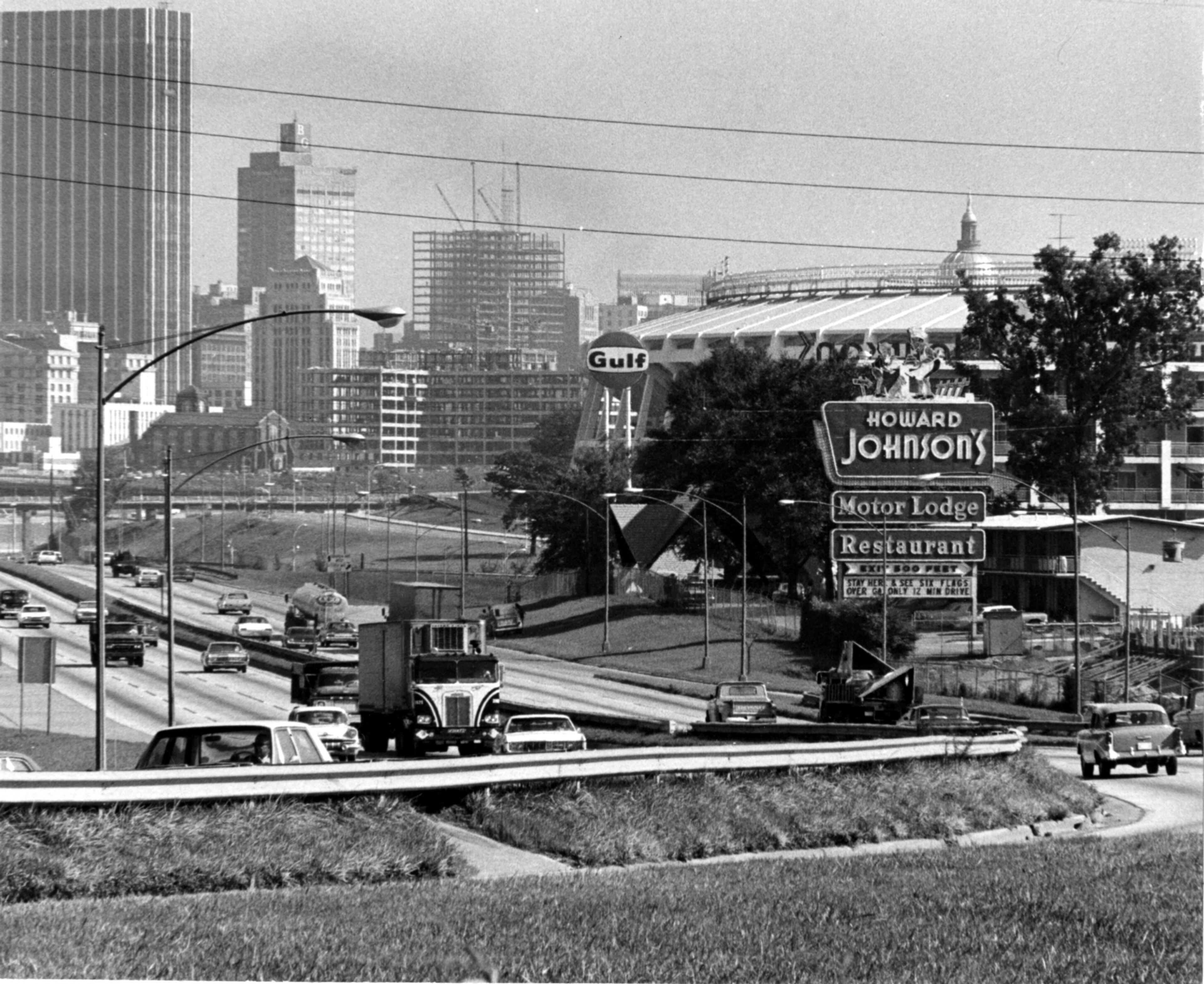 Stadium and sparkling skyscrapers greet motorists coming up I-75 from the south in August 1967. AJC File.