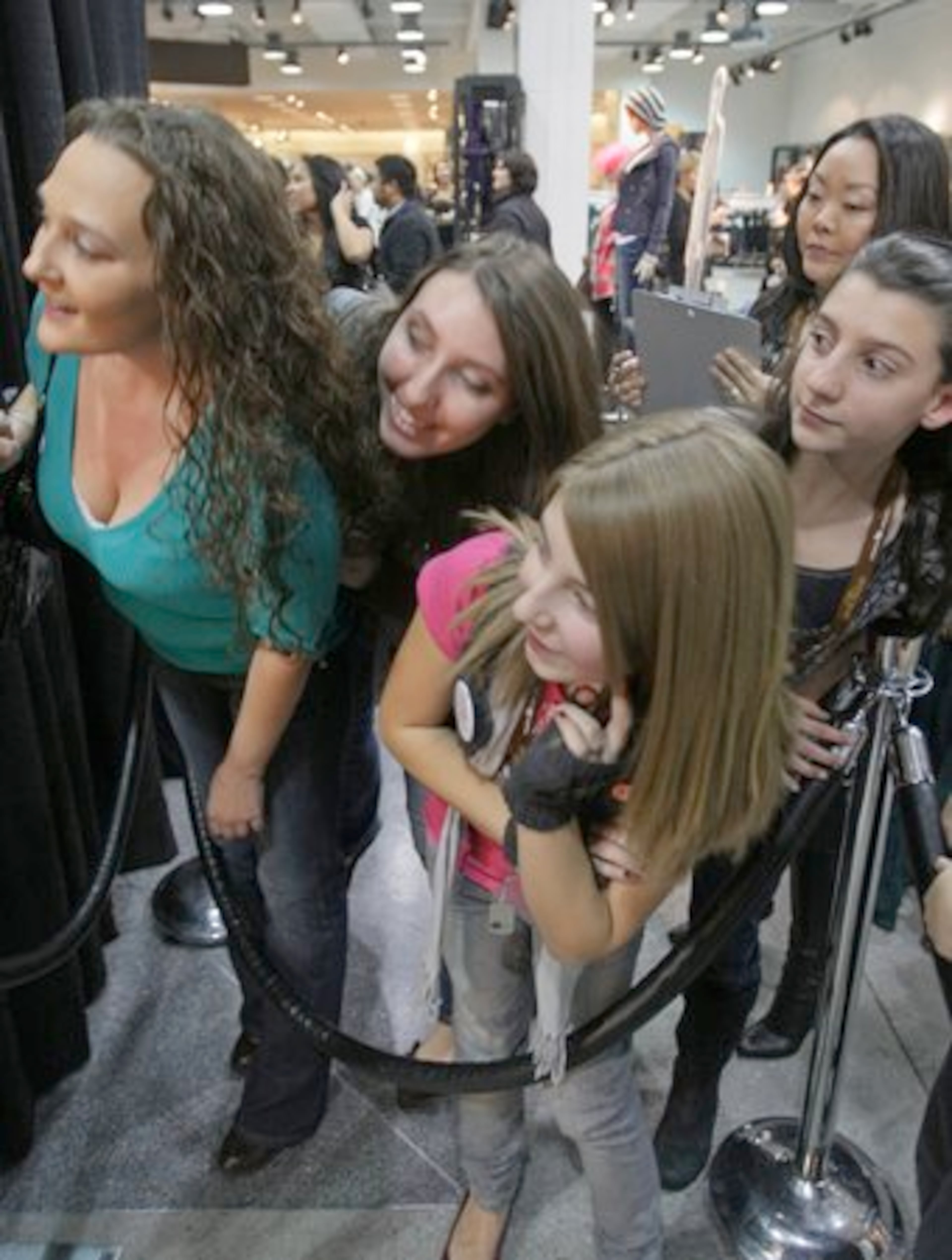 Fans from left are: Jennifer Robinson, from Renton; Alyssa Milan, from Tacoma; Ayriena Swanson, wearing pink; and Amber Meslar, both 12 and from SeaTac. They sat in line hours to be first in line to meet Felix and Charles.