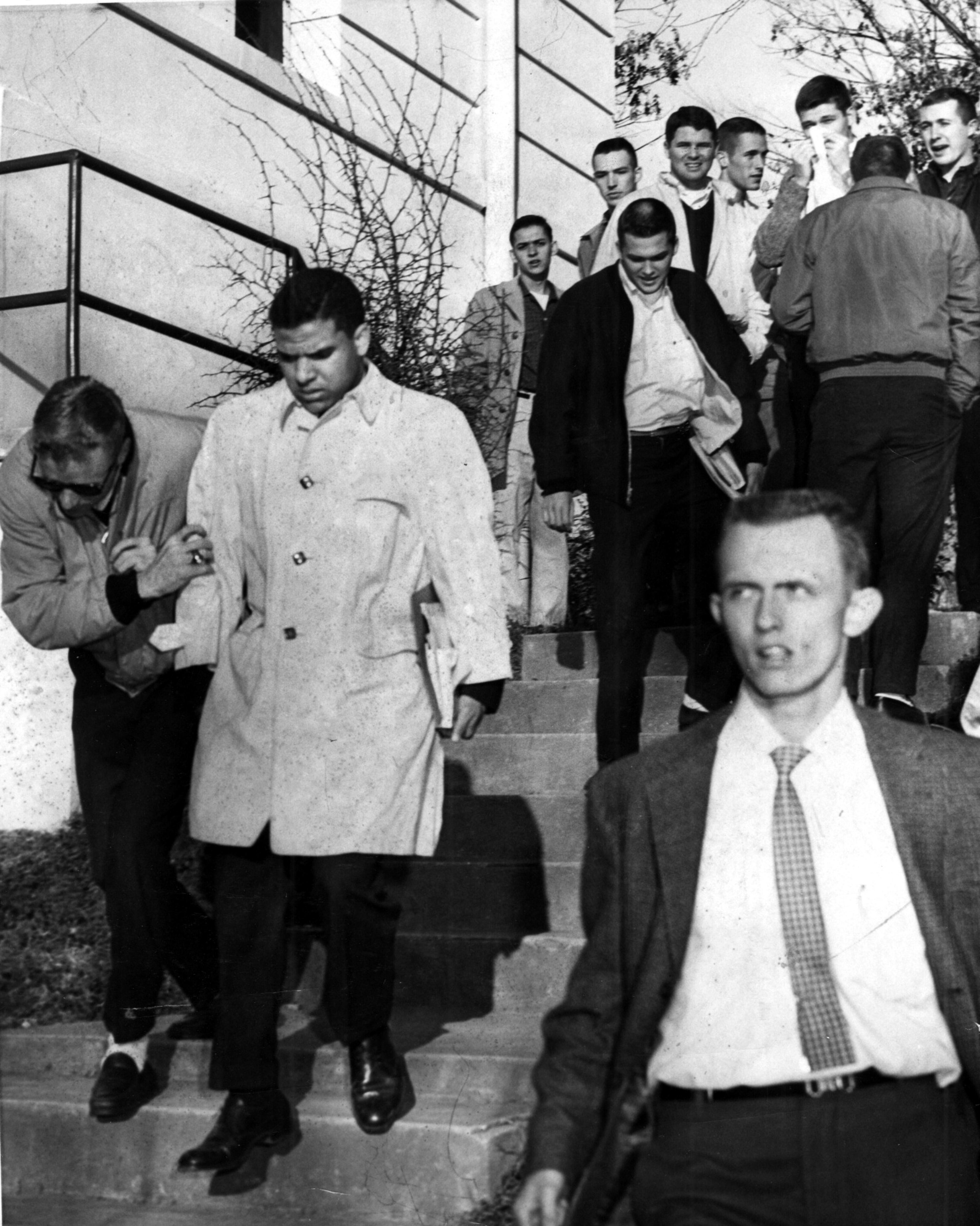 Hamilton Holmes walks down the steps on his way to the Infirmary where he presented his credentials for clearance for entrance to the University of Georgia on Jan. 10, 1961. Charles Pugh/AJC