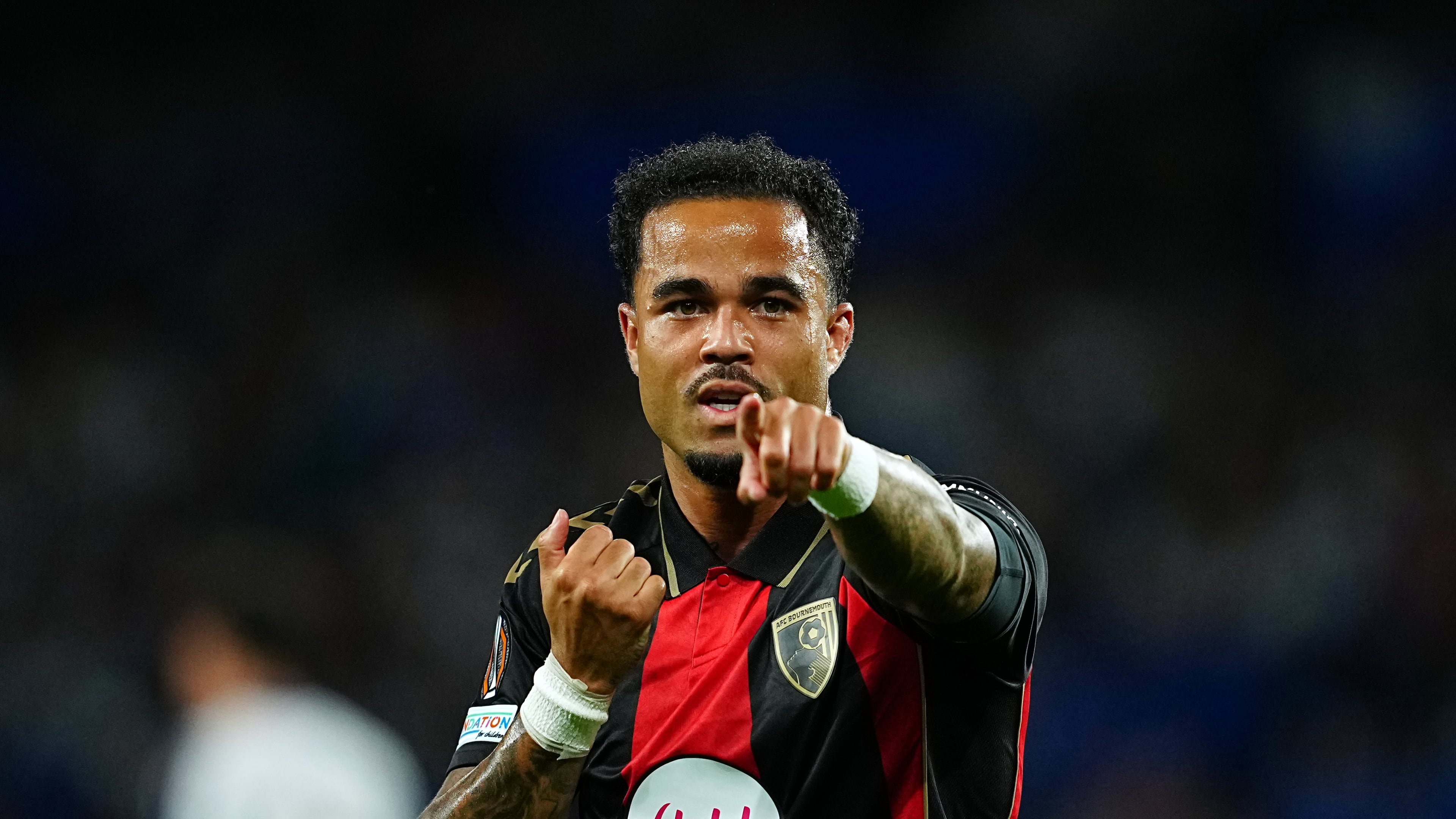 Bournemouth's Justin Kluivert celebrates after scoring the opening goal during the Europa League opening phase soccer match between Real Sociedad and AFC Bournemouth in San Sebastian, Spain, Thursday, Sept. 17, 2026. (AP Photo/Miguel Oses)