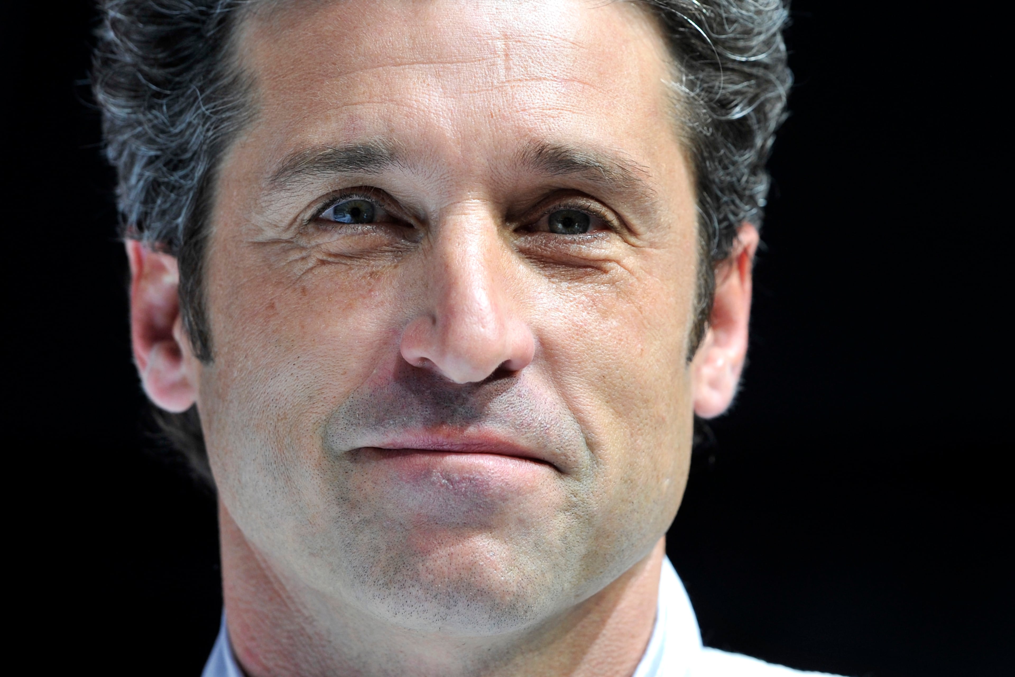 GENEVA, SWITZERLAND - MARCH 04: Patrick Dempsey unveils the Porsche 911 GT3 RSR as his team is selected to compete in the 24 Hours of Le Mans during the press day of the 84th International Motor Show which will showcase novelties of the car industry on March 4, 2014 in Geneva, Switzerland. (Photo by Harold Cunningham/Getty Images)