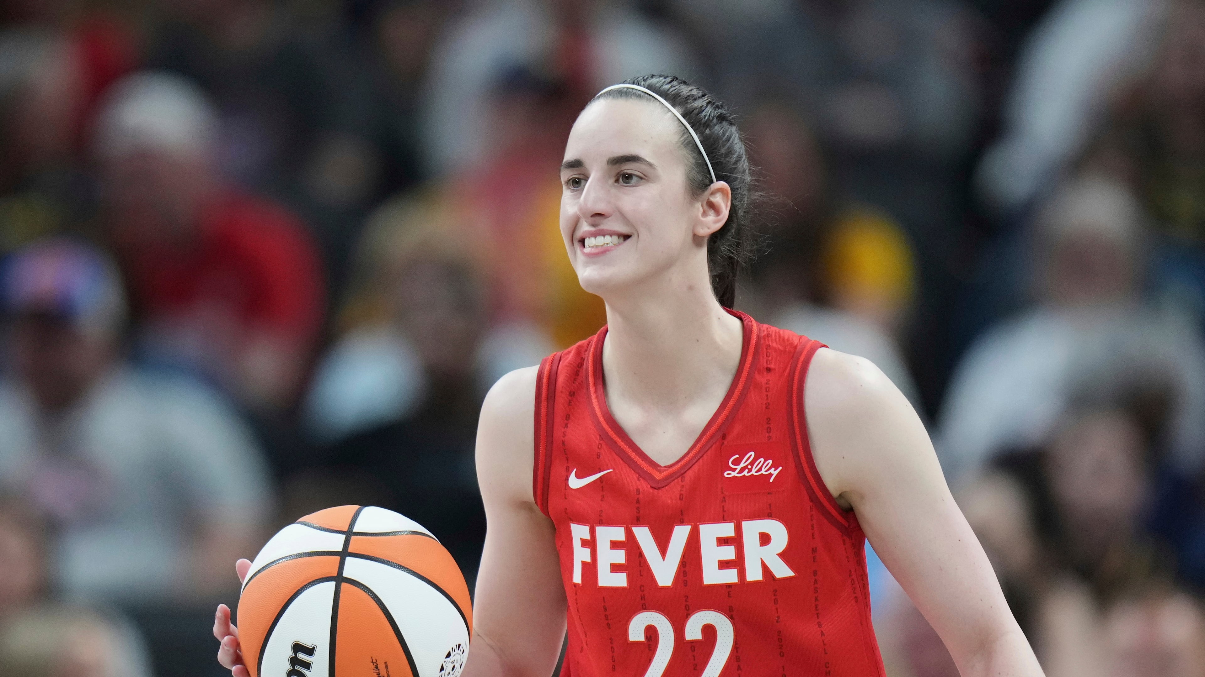 FILE - Indiana Fever guard Caitlin Clark (22) in action during a WNBA basketball game against the Chicago Sky in Indianapolis, May 17, 2025. (AP Photo/AJ Mast, File)