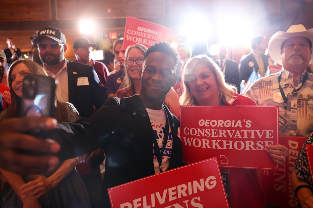 Andre Stafford, the GOP nominee in Smyrna-based House District 42, seen here at an election watch party U.S. Rep. Mike Collins in Jackson in May. (Arvin Temkar/AJC)