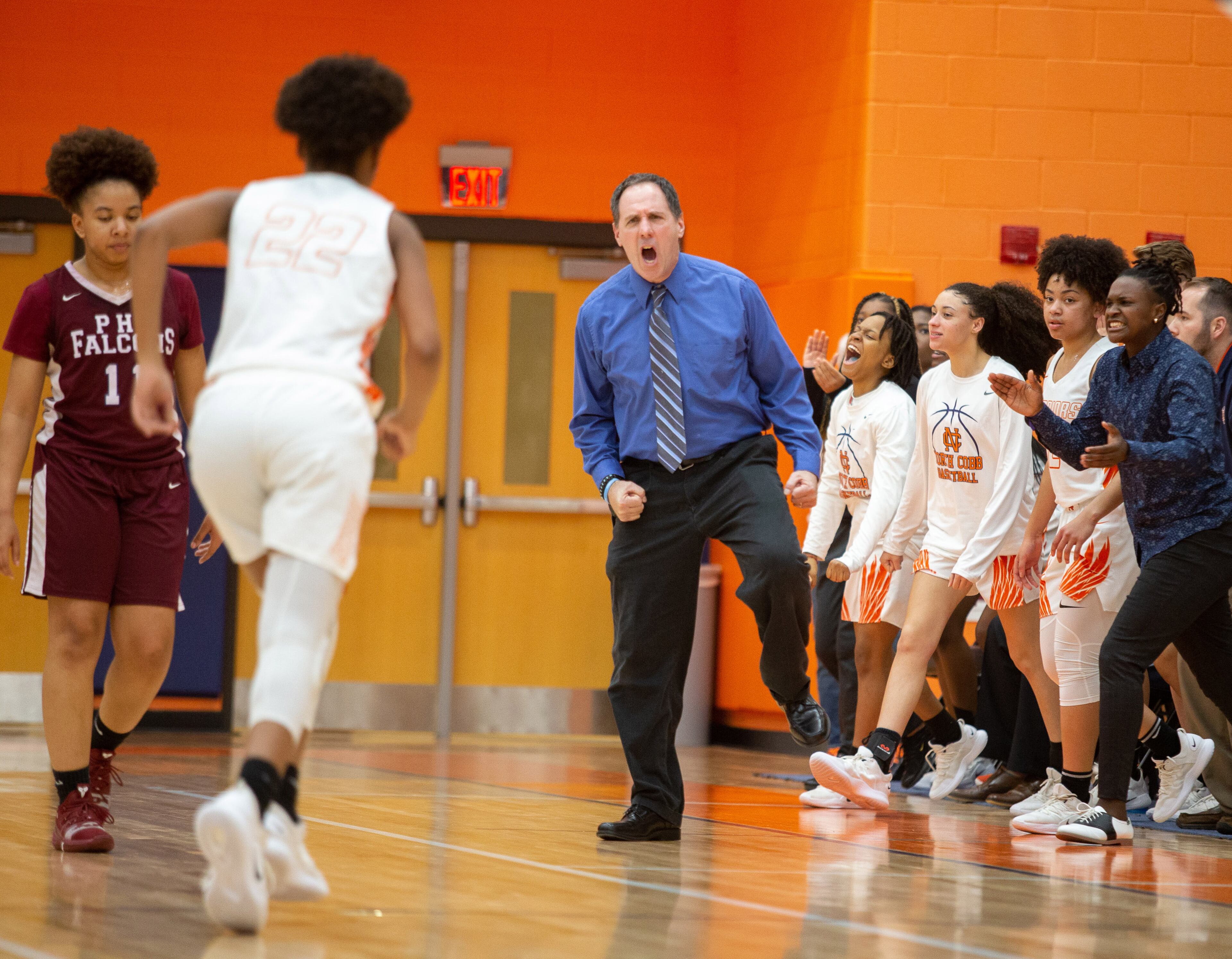 North Cobb High School head coach John Speeney cheers on his team during the first round of the girls' high school basketball tournament at North Cobb High School in Kennesaw February 15, 2018. STEVE SCHAEFER / SPECIAL TO THE AJC