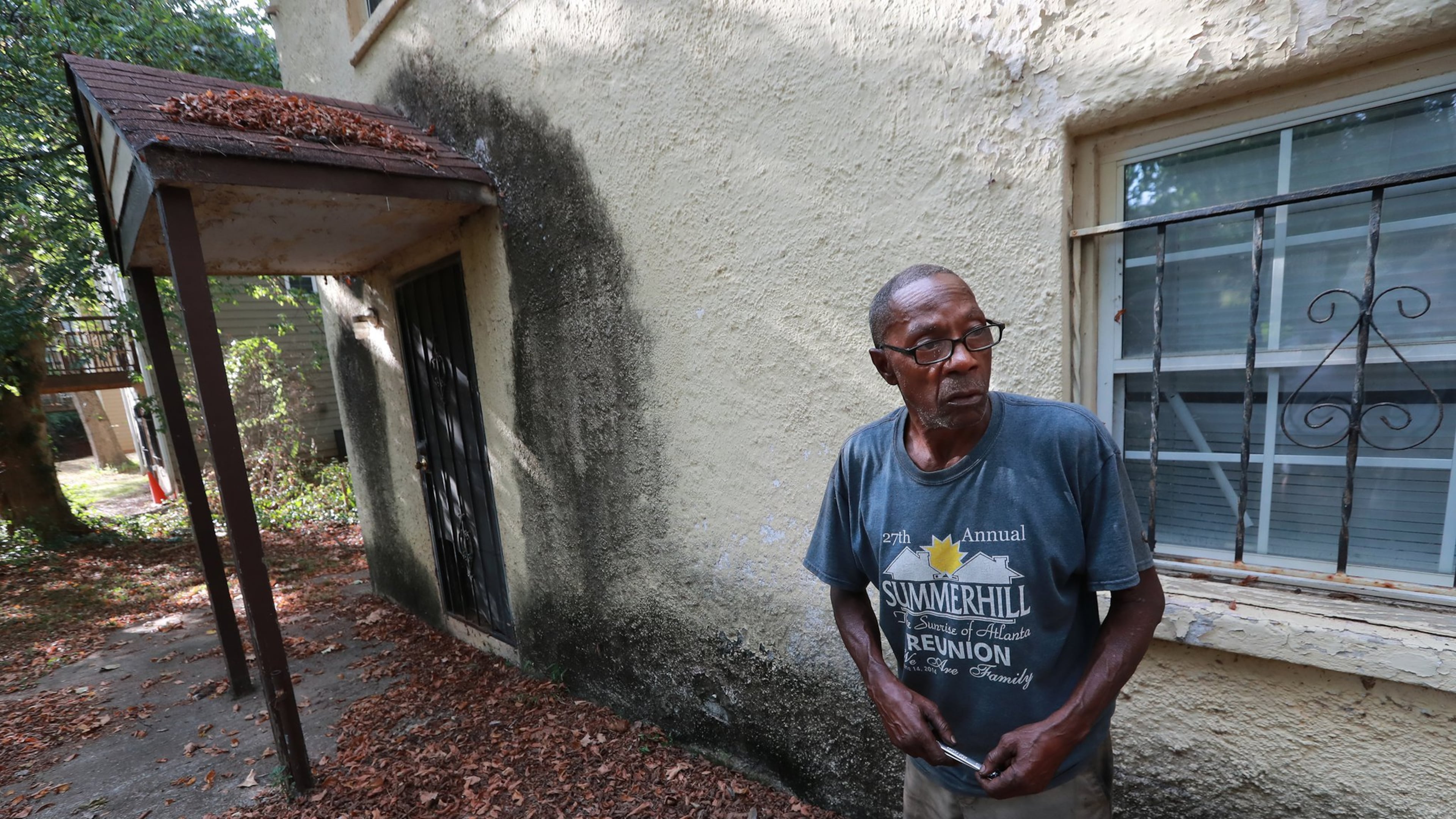 September 26, 2019 Atlanta: Life-long resident Perry Holloway, 66, stands beside a home he owns on South Avenue showing the mold growth that has made it unlivable as a result of flooding in the area. Curtis Compton/ccompton@ajc.com