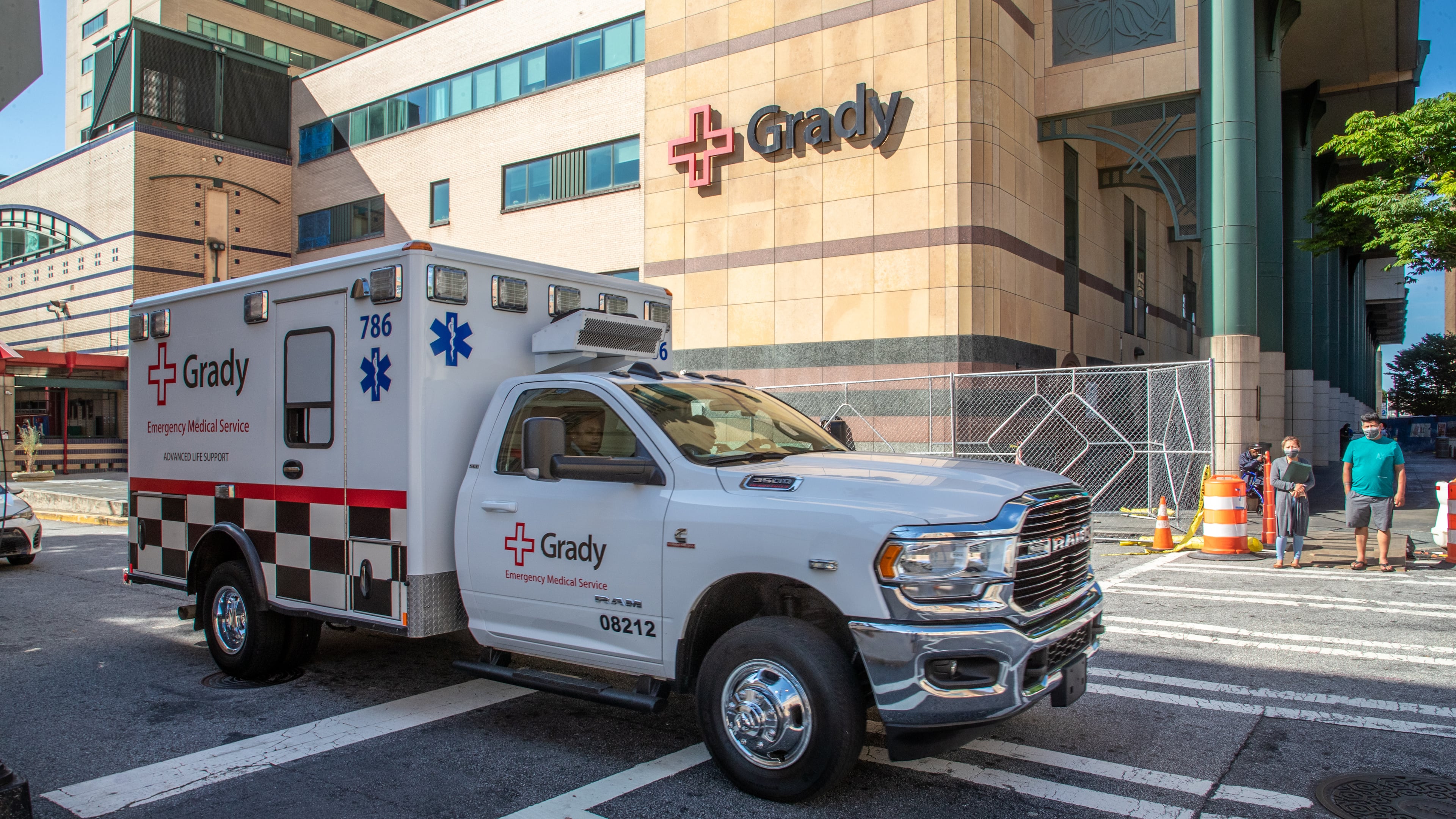 An ambulance leaves Grady Memorial Hospital in Atlanta. Grady’s administration said nurses and other unspecified employees who receive block pay will see a 40% reduction in those rates beginning Sept. 26. (Steve Schaefer/AJC 2022)