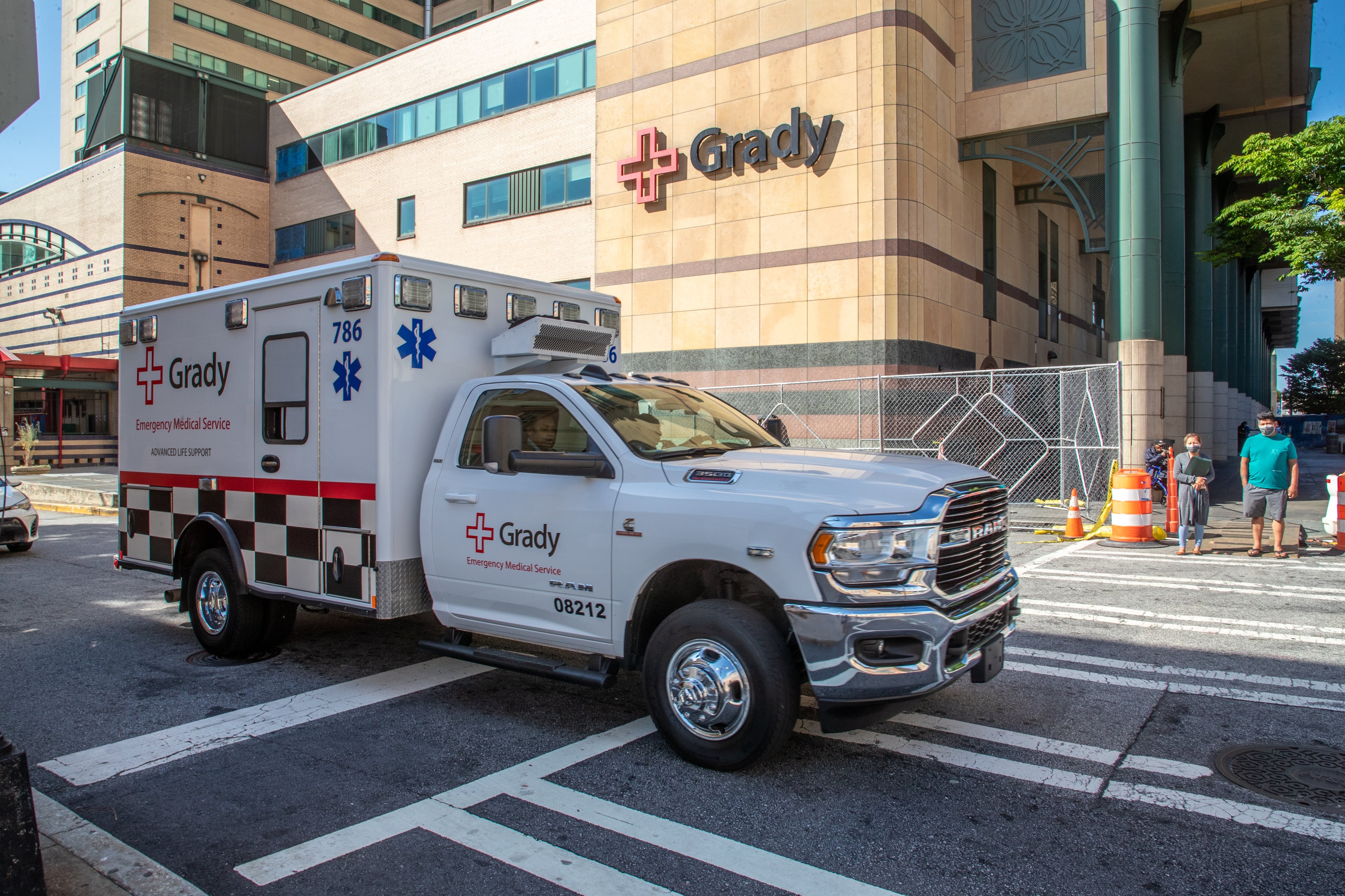 An ambulance leaves Grady Memorial Hospital in Atlanta. Grady’s administration said nurses and other unspecified employees who receive block pay will see a 40% reduction in those rates beginning Sept. 26. (Steve Schaefer/AJC 2022)