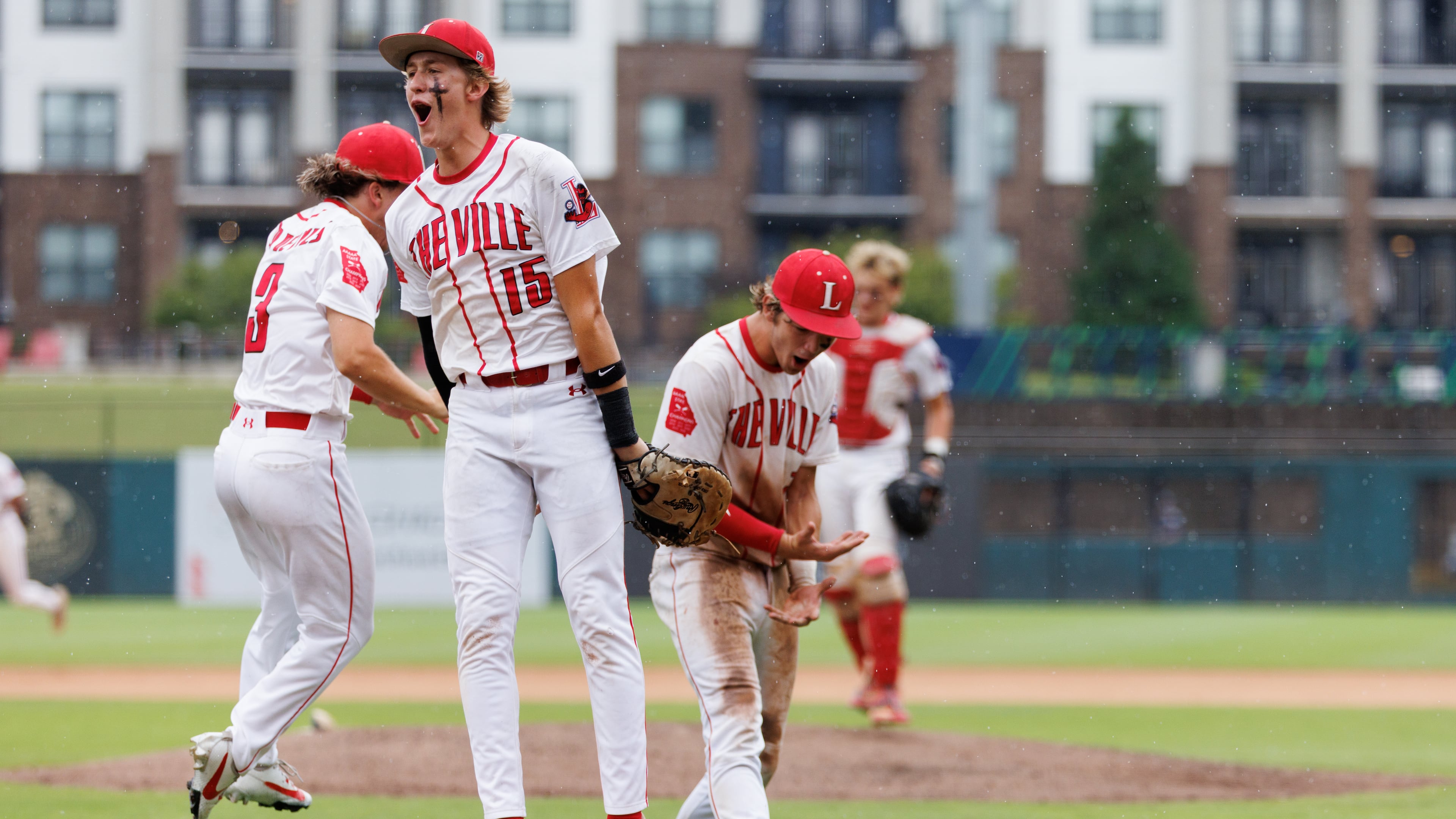 Loganville first basemen Zac Cuneio (15) celebrates after Loganville beat Pope the seventh inning of Game 1 of the GHSA Class 5A Baseball State Championship Series at Gwinnett Field on Monday, May 25, 2026, in Lawrenceville. (Estela Muñoz/AJC)