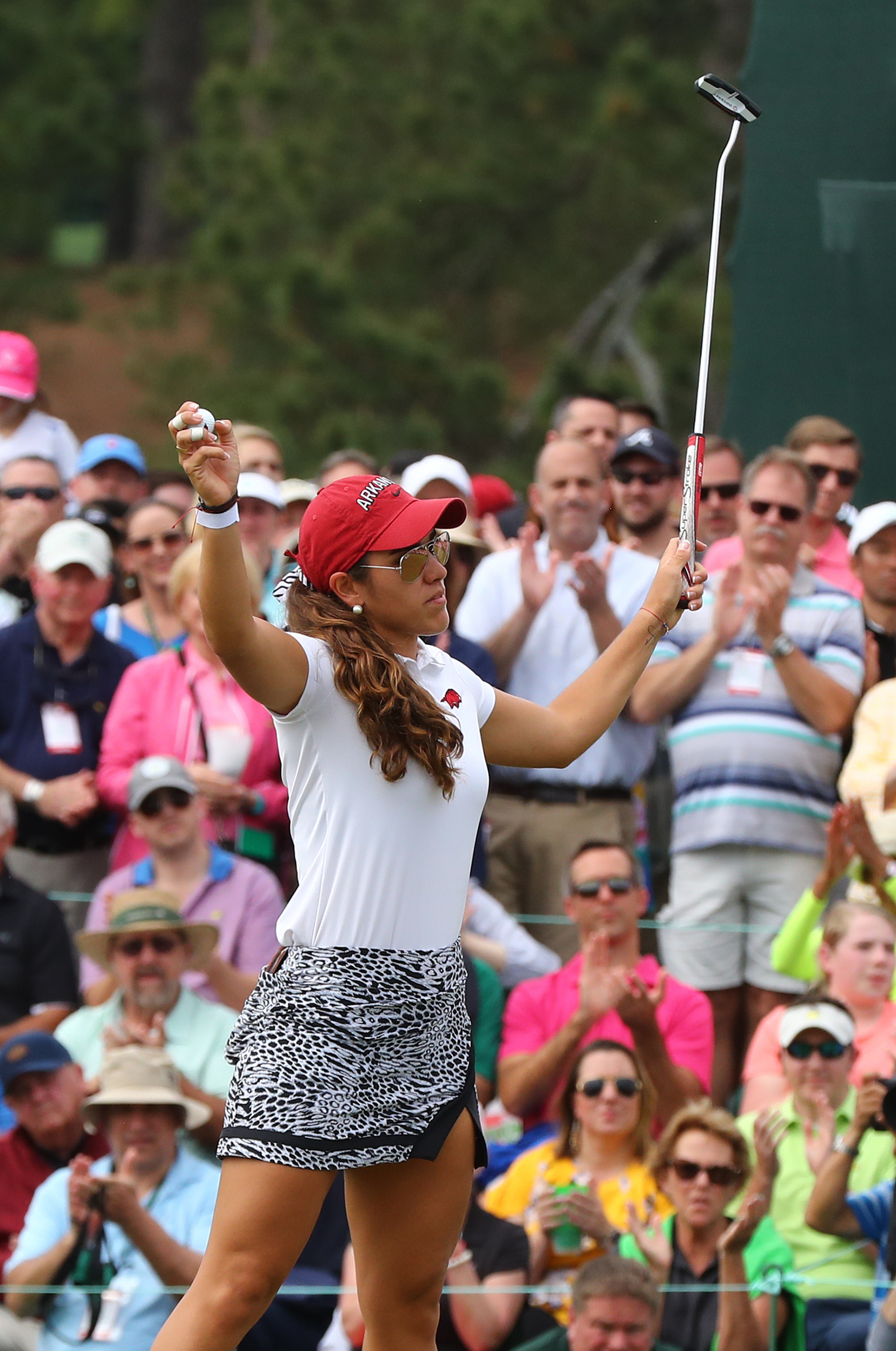 Maria Fassi accepts the applause of the patrons on the 18th green finishing at 6-under par for second place in the inaugural Augusta National Women's Amateur at Augusta National Golf Club on Saturday, April 6, 2019, in Augusta. Curtis Compton/ccompton@ajc.com