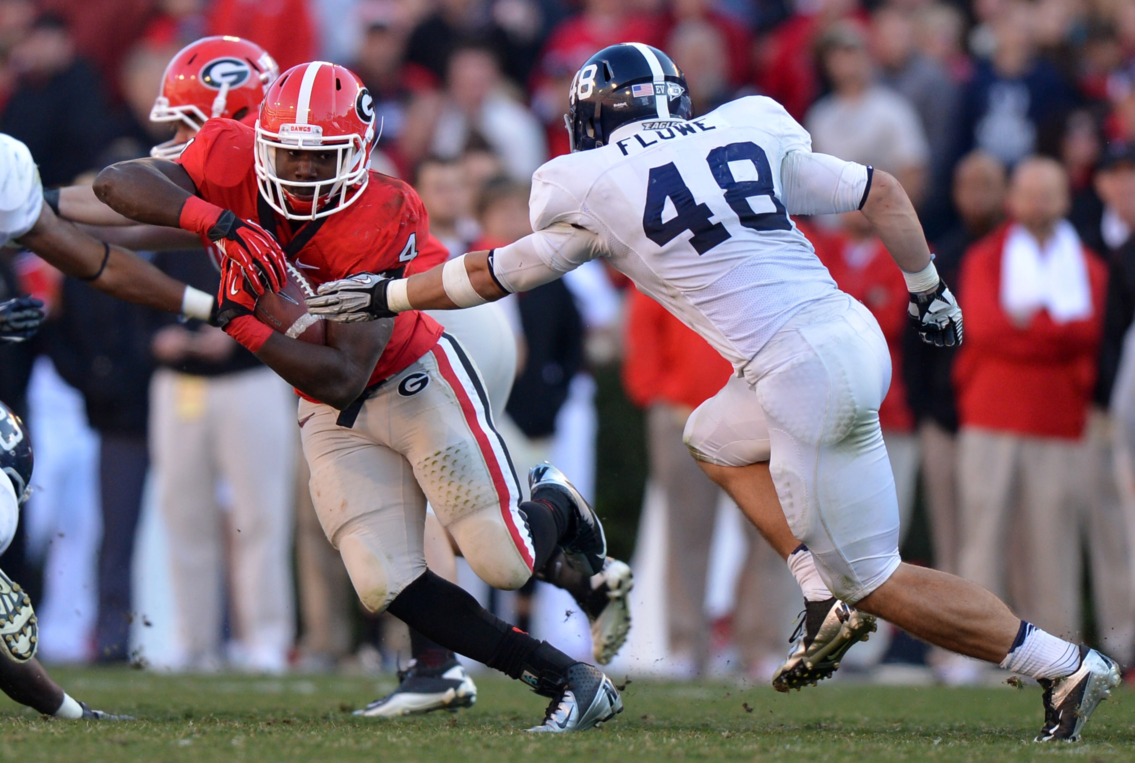 Keith Marshall tries to elude the tackle of Georgia Southern's Patrick Flowe.
