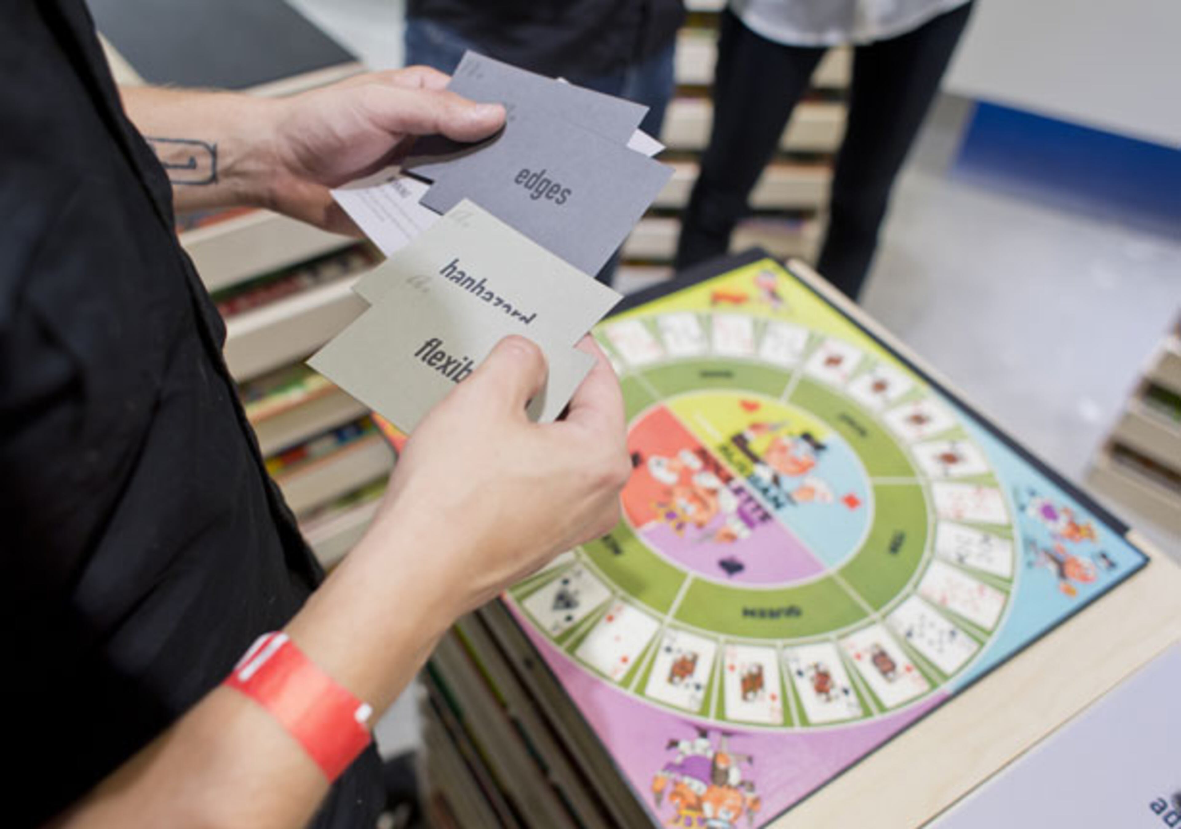 With the help of a gallery host serving as a judge, two guests can play Flatlands. This exercise in aesthetics and debate draws from 165 game boards archived in the exhibit “XYZ: Alternate Voices in Game Design” at the Museum of Design Atlanta. The show continues through Sept. 2, 2013.