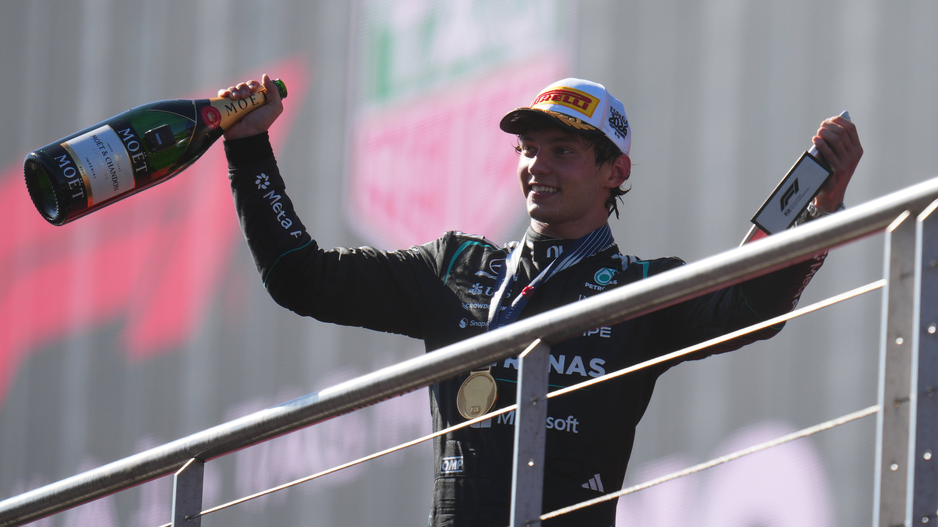 Mercedes driver Andrea Kimi Antonelli of Italy celebrates on the podium after winning the Spanish Formula One Grand Prix race in Madrid, Sunday, Sept. 13, 2026. (AP Photo/Manu Fernandez)