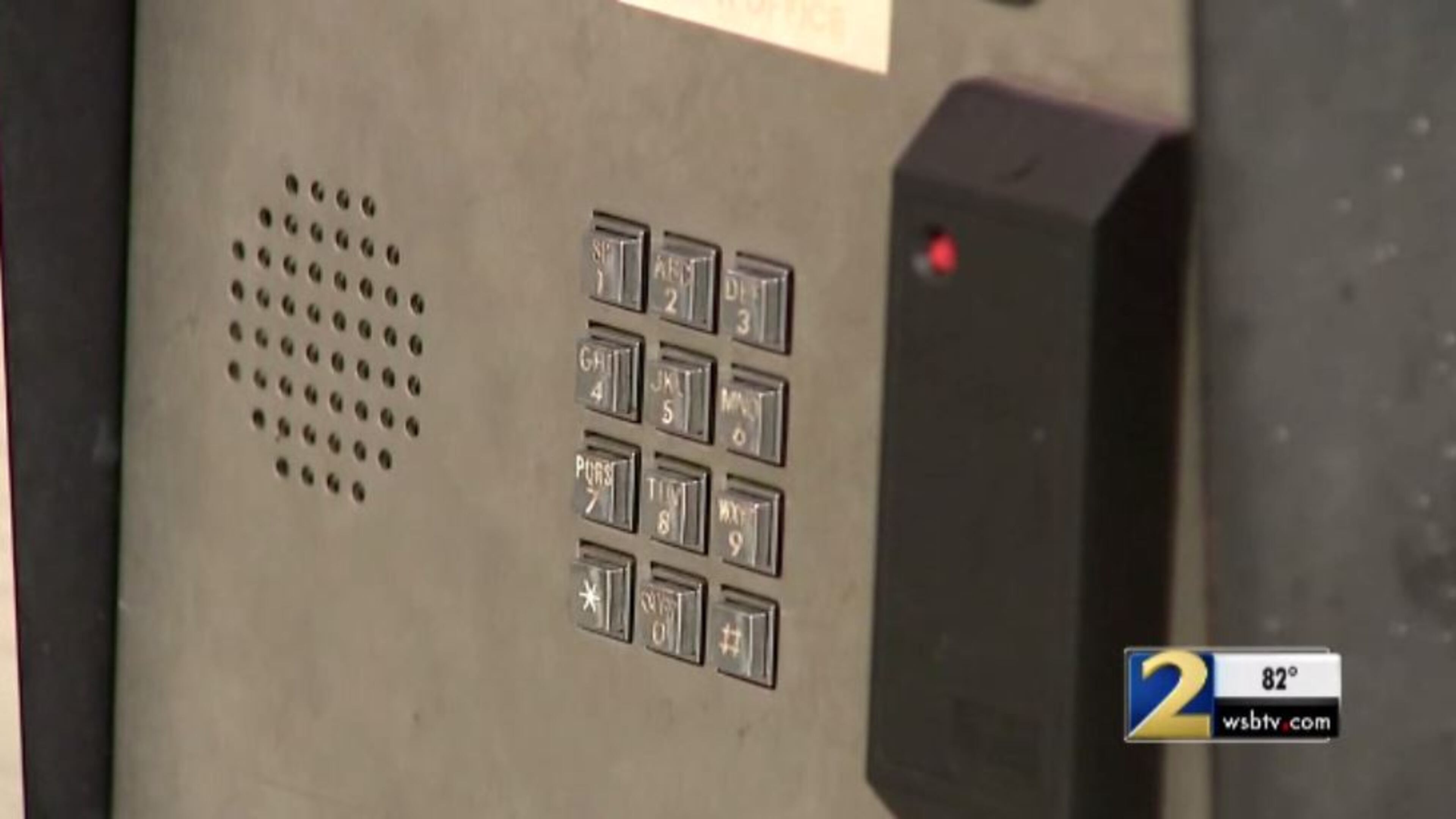 A woman said she was robbed at gunpoint by a man pretending to be a resident of her apartment complex. (Credit: Channel 2 Action News)