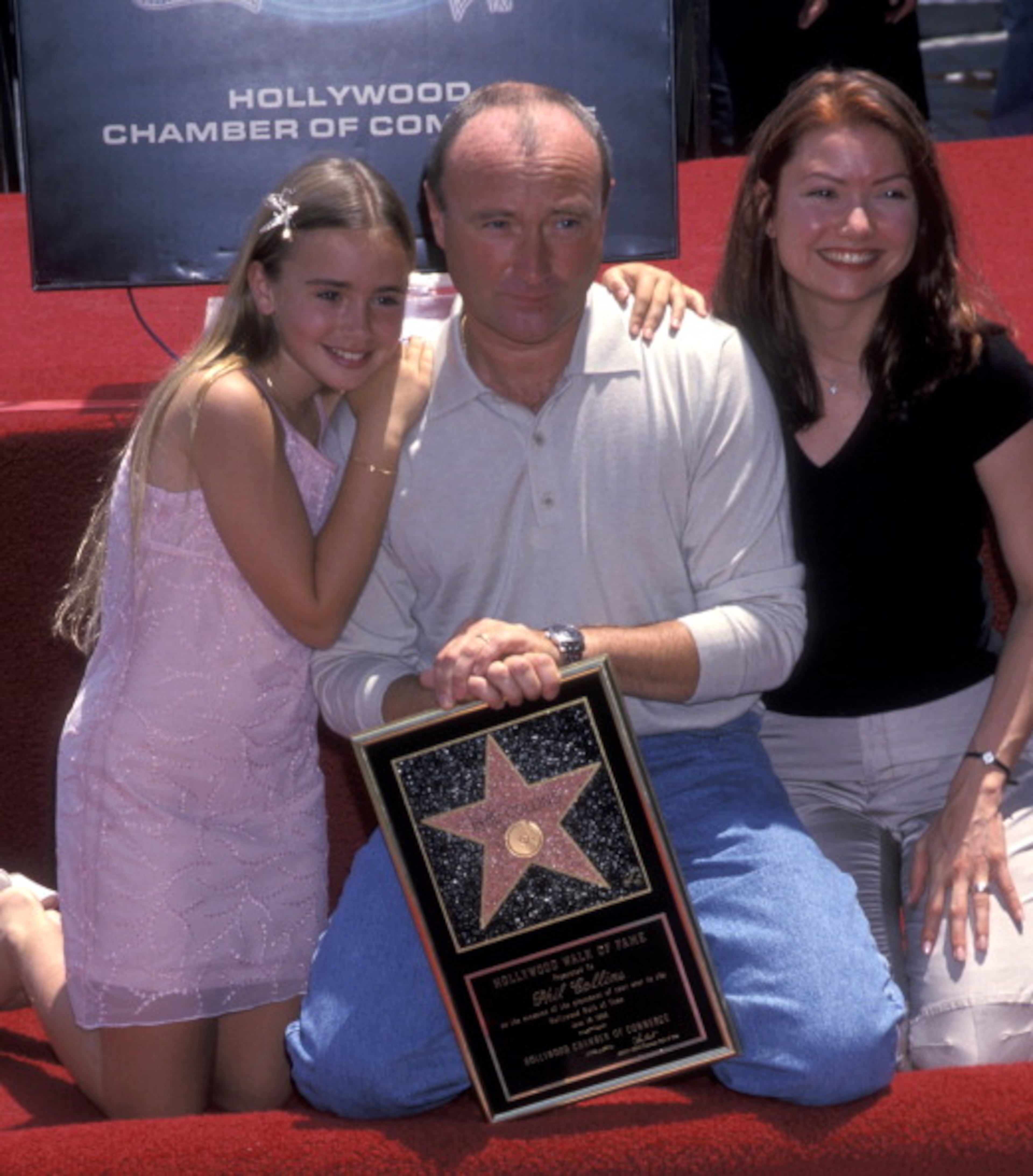 HOLLYWOOD, CA - JUNE 16: Phil Collins and Lily Collins attend Phil Collin Walk of Fame Star Ceremony on June 16, 1988 in Hollywood, California. (Photo by Ron Galella, Ltd./WireImage)