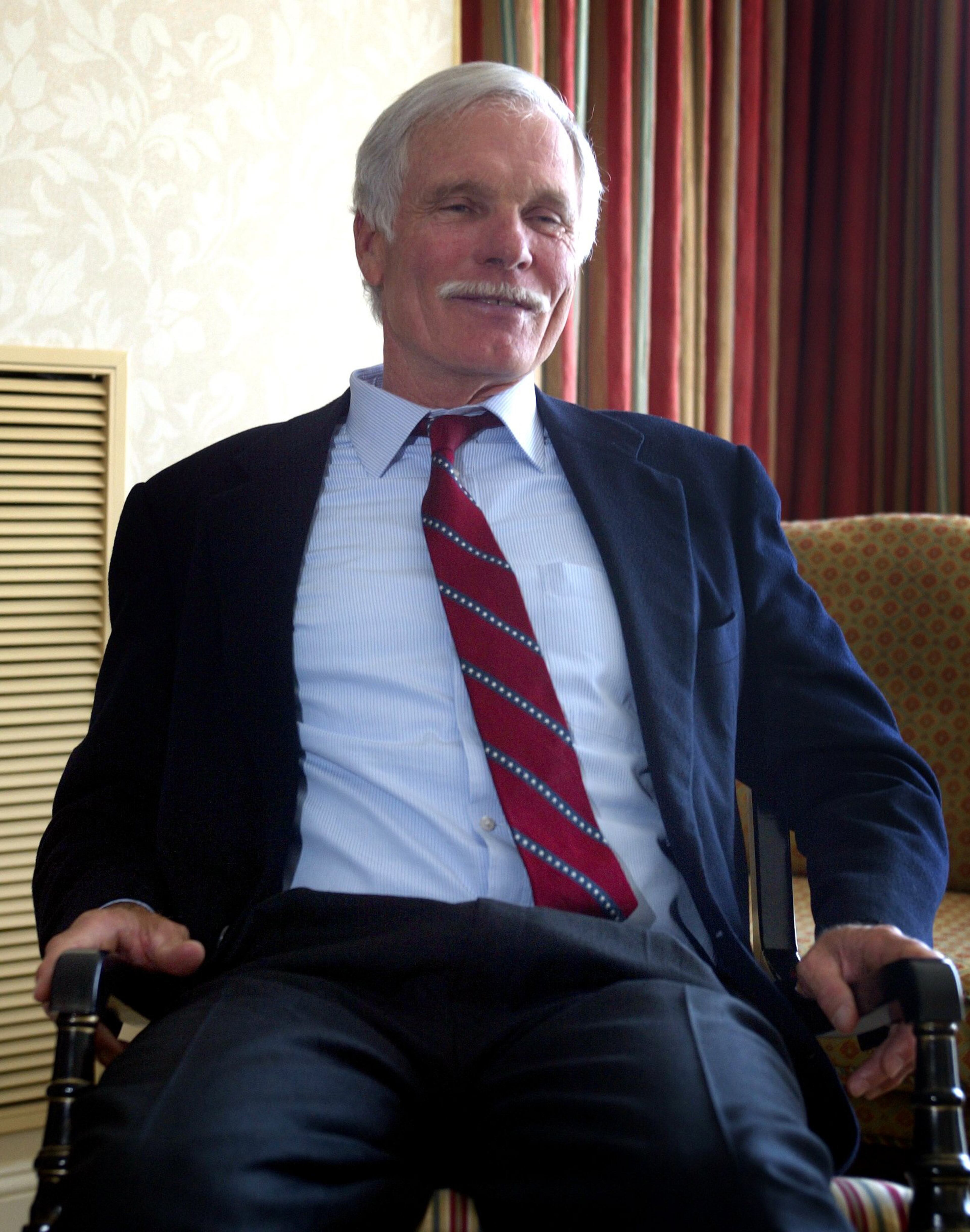 The 2000s would be difficult years for Ted Turner, seen here in 2003. That year, he resigned as Time Warner vice chairman. Three years later, resigned from the Time Warner board as well, in what was a slow and bitter falling-out with the company. In 2007, Time Warner would sell the Atlanta Braves to Liberty Media. (Rick McKay / AJC file)