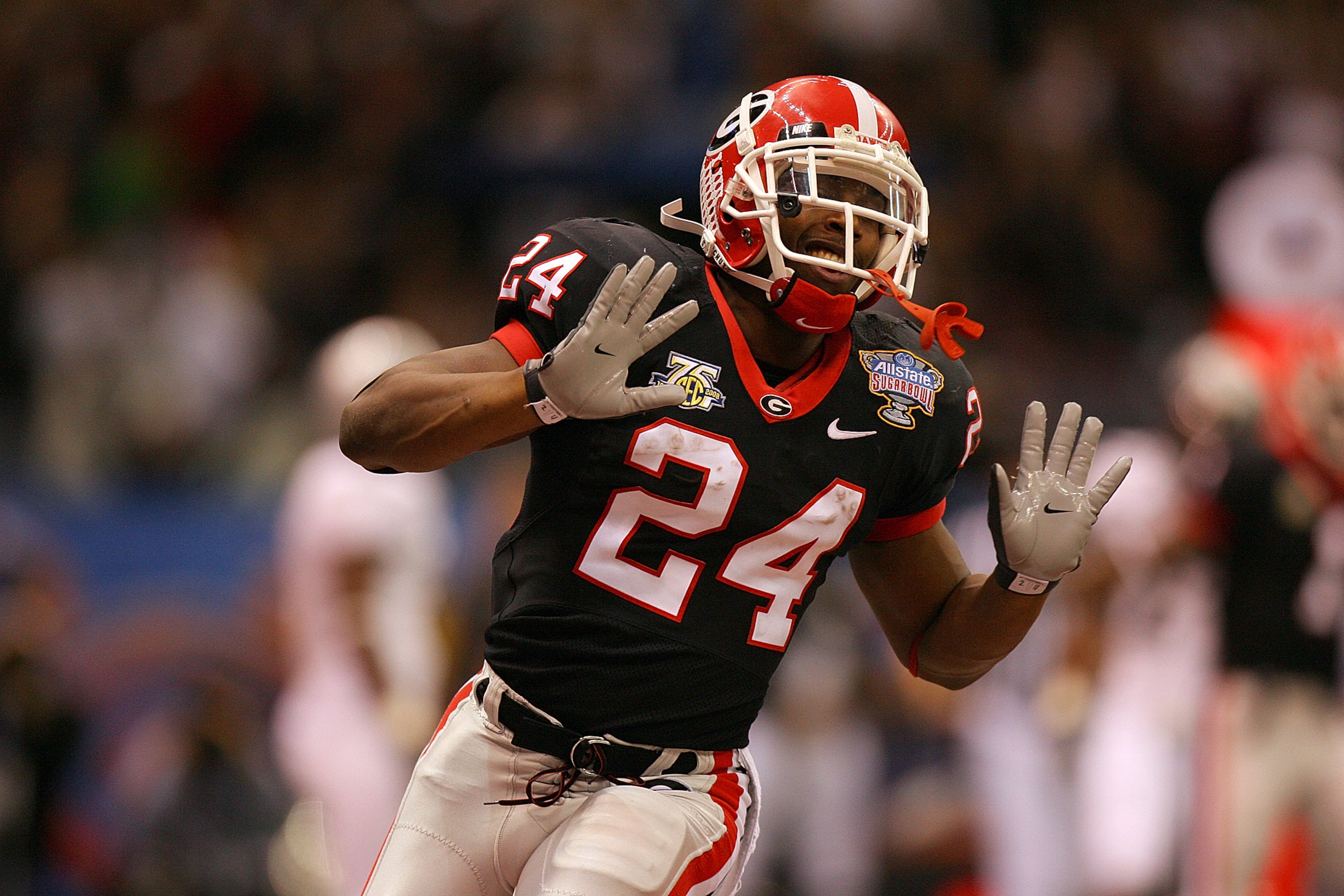 Georgia tailback Knowshon Moreno (24) motions with his hands after scoring his second touchdown against Hawaii in the Sugar Bowl on Jan. 1, 2008 in New Orleans. BRANT SANDERLIN / AJC Staff
