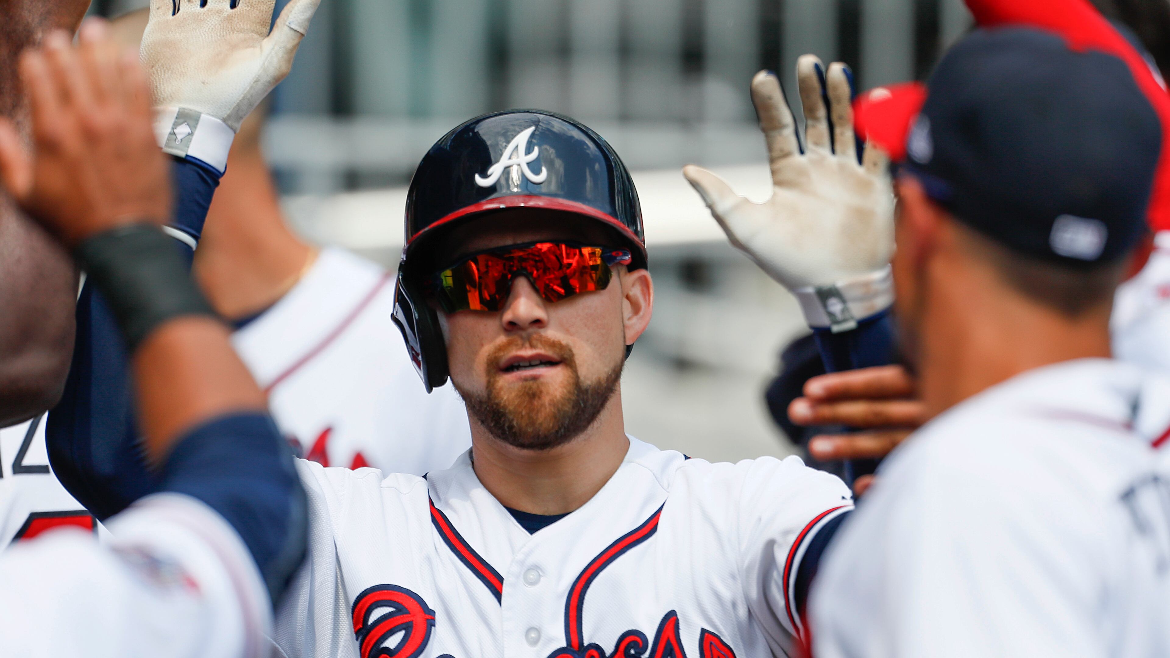 Atlanta Braves' Ender Inciarte (11) celebrates with teammates after hitting a solo home run in the third inning of the first game of a baseball doubleheader against the Texas Rangers, Wednesday, Sep. 6, 2017, in Atlanta. (AP Photo/Todd Kirkland)