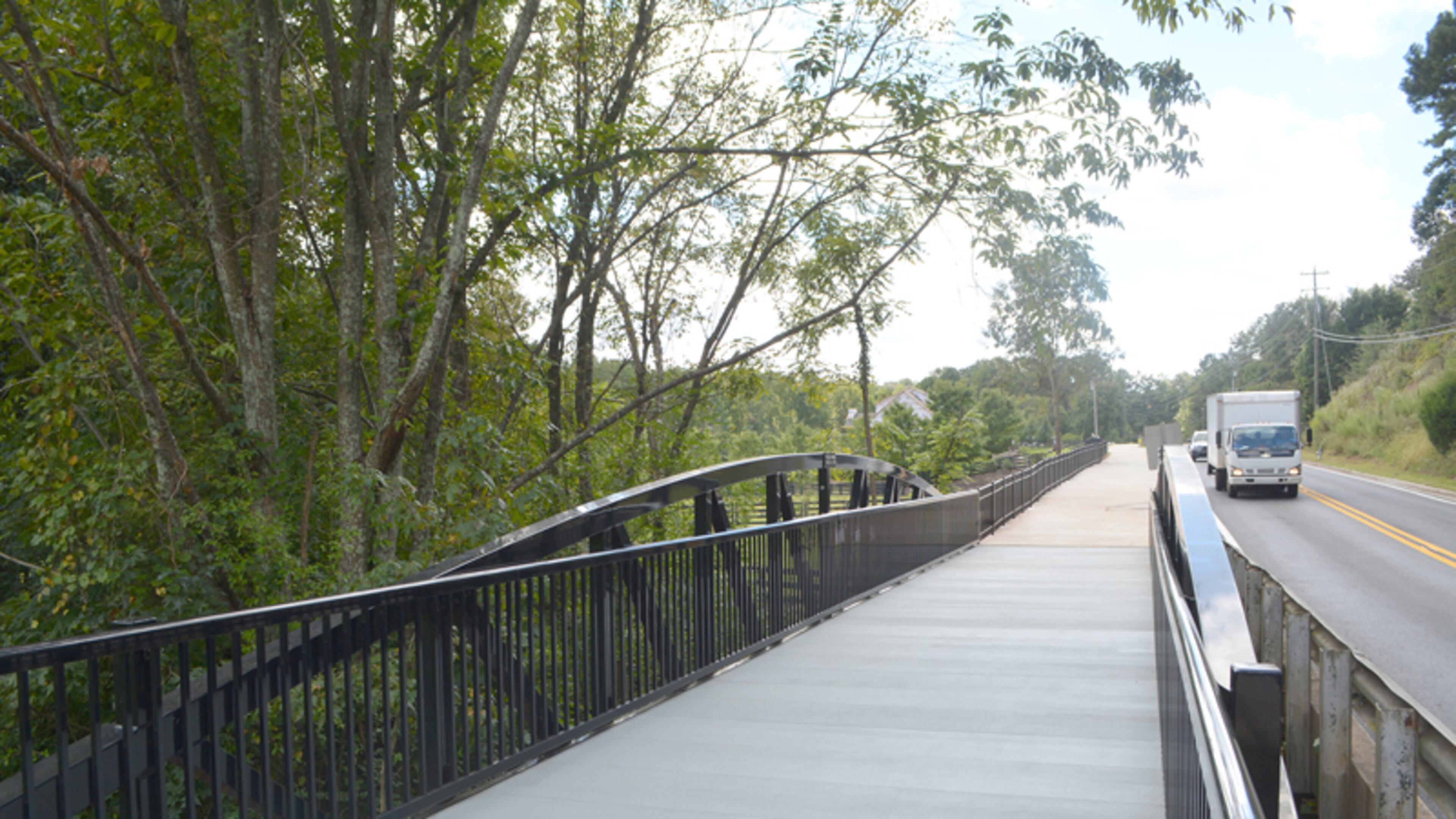 A newly finished pedestrian bridge on Brumbelow Road between Mackinac and Stoney Ridge drives improves safety for people on foot in Johns Creek. CITY OF JOHNS CREEK