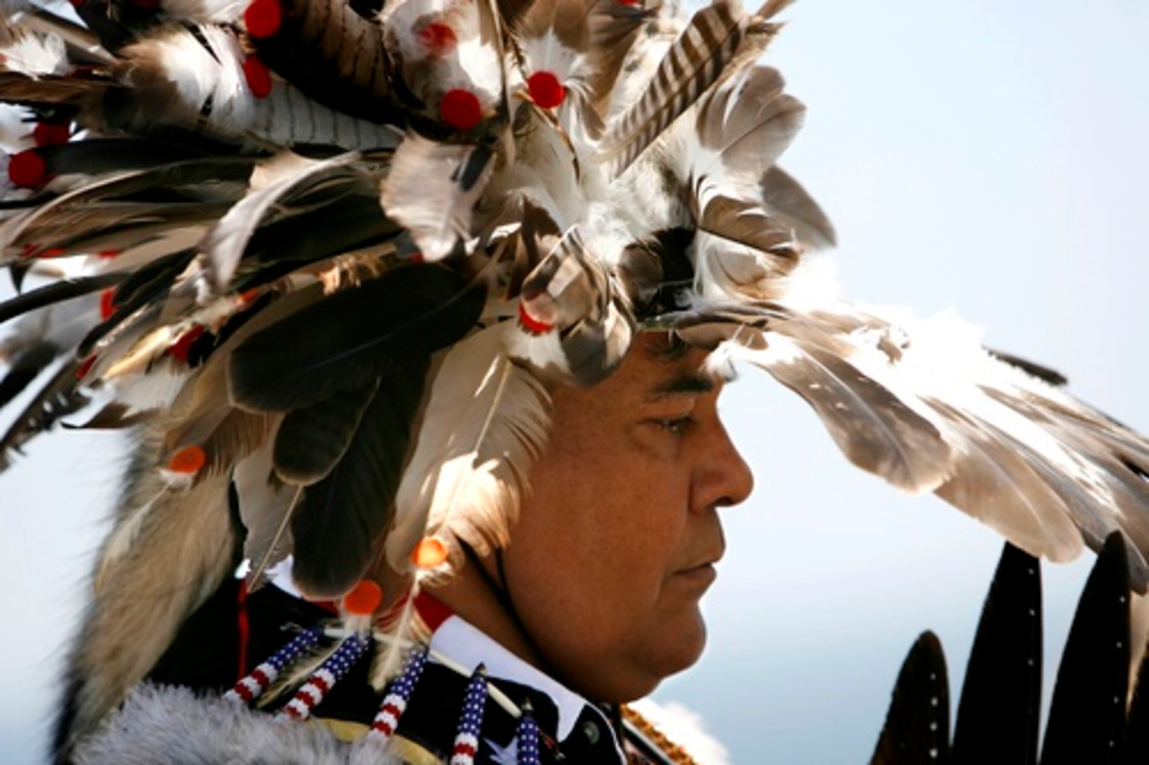 Chief Harry Dakota of the Oneida/Ojibwa tribes gathers his thoughts before leading in the Medicine Wheel Ceremony for rain at the top of Stone Mountain Saturday.