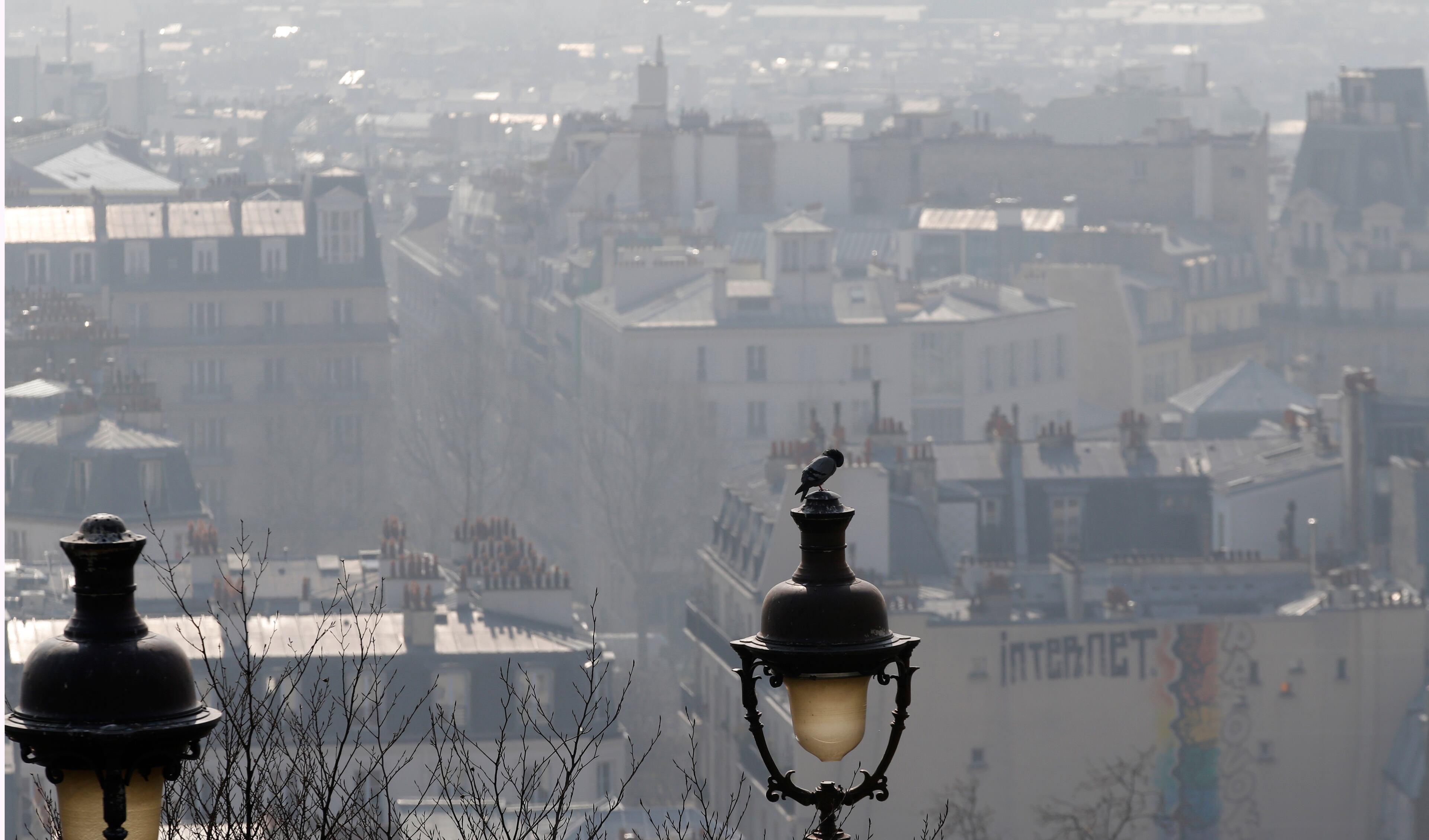 The center of Paris is seen through the smog, Thursday March 13, 2014, as pollution over the French capital is at high levels.