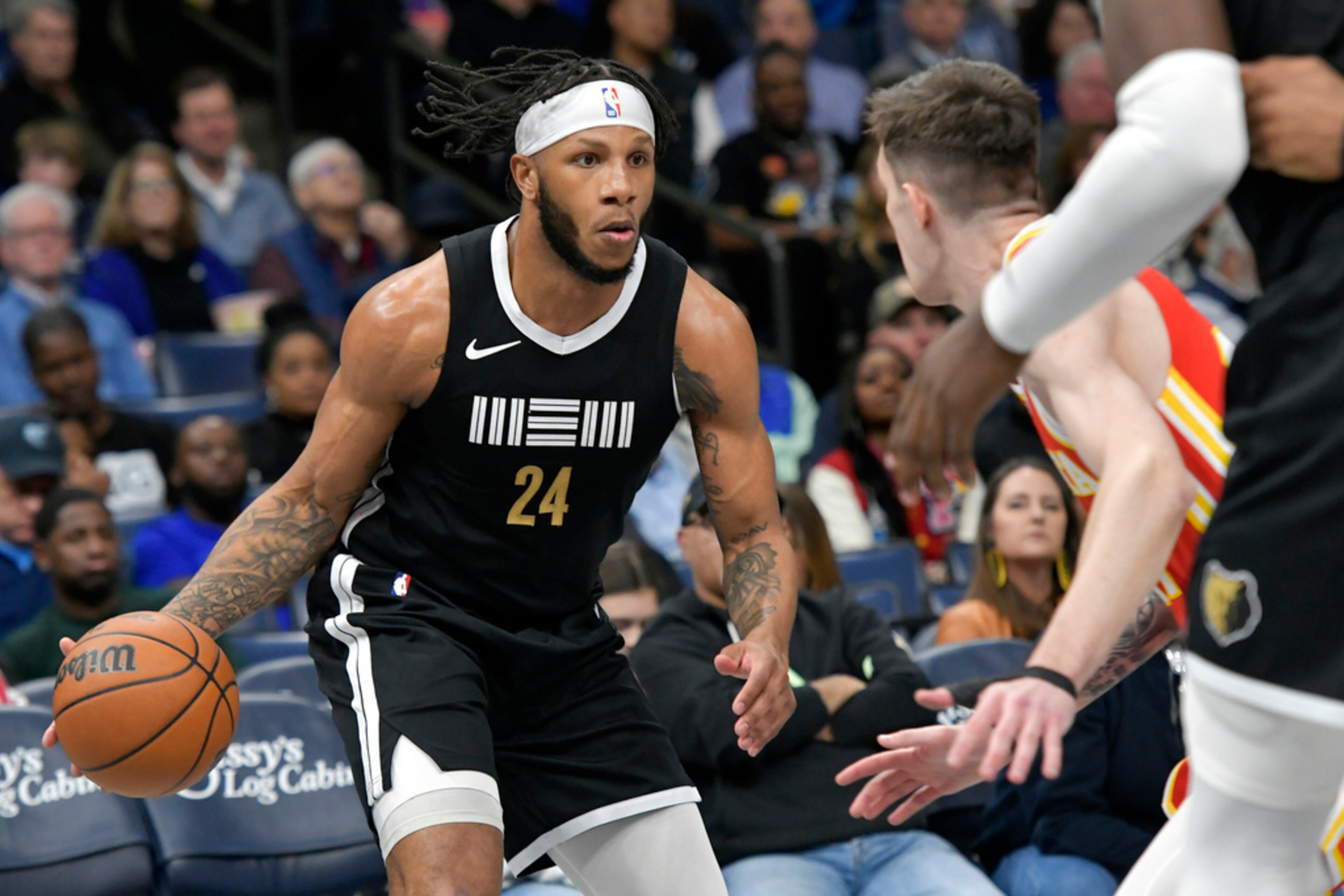 Memphis Grizzlies forward Lamar Stevens (24) surveys the court during the first half of the team's NBA basketball game against the Atlanta Hawks on Friday, March 8, 2024, in Memphis, Tenn. (AP Photo/Brandon Dill)
