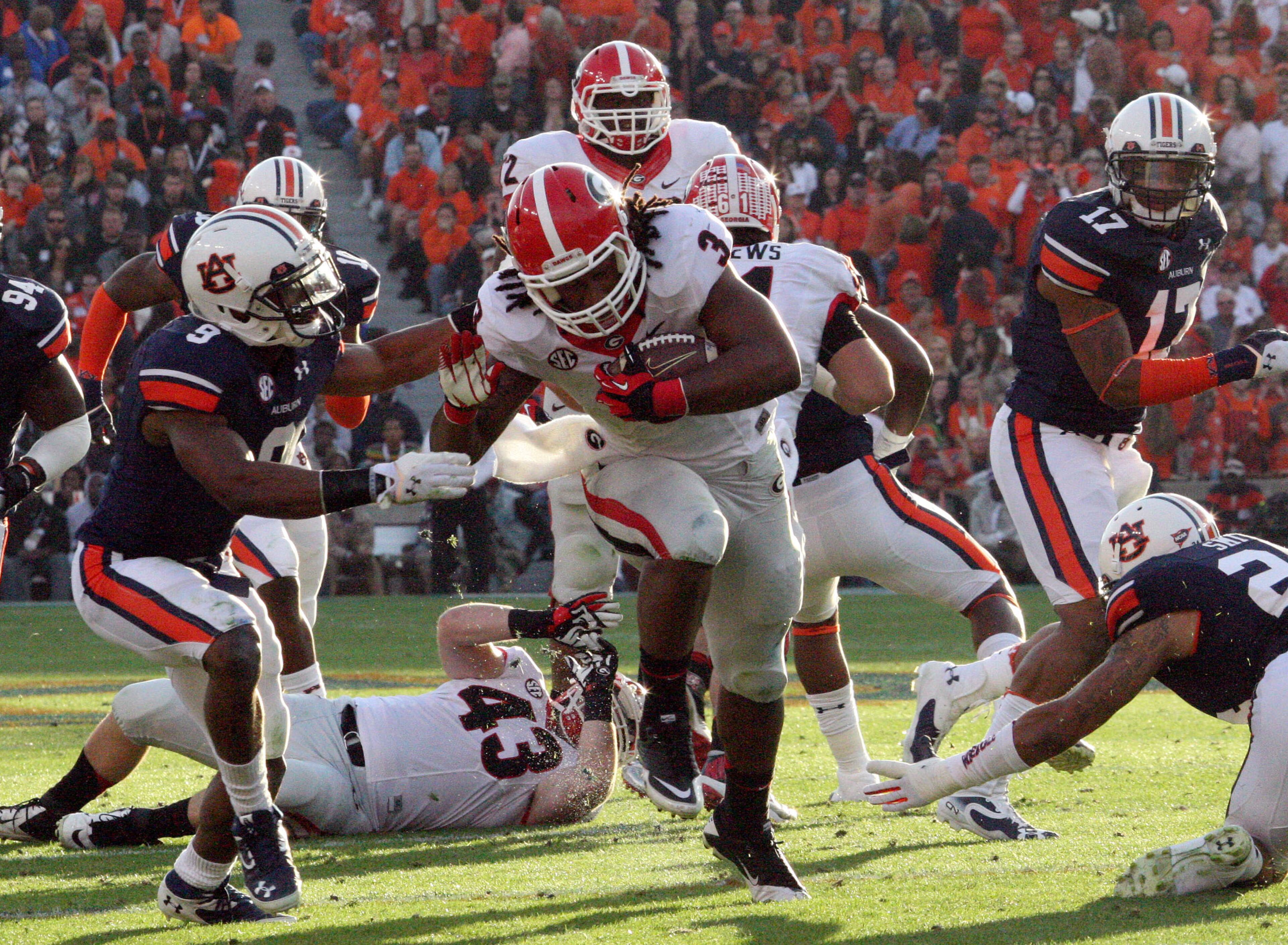 Georgia Bulldogs running back Todd Gurley rushes for a touchdown in the first half of their game against the Auburn Tigers at Jordan-Hare Stadium Saturday afternoon in Auburn, Al., November 16, 2013. .