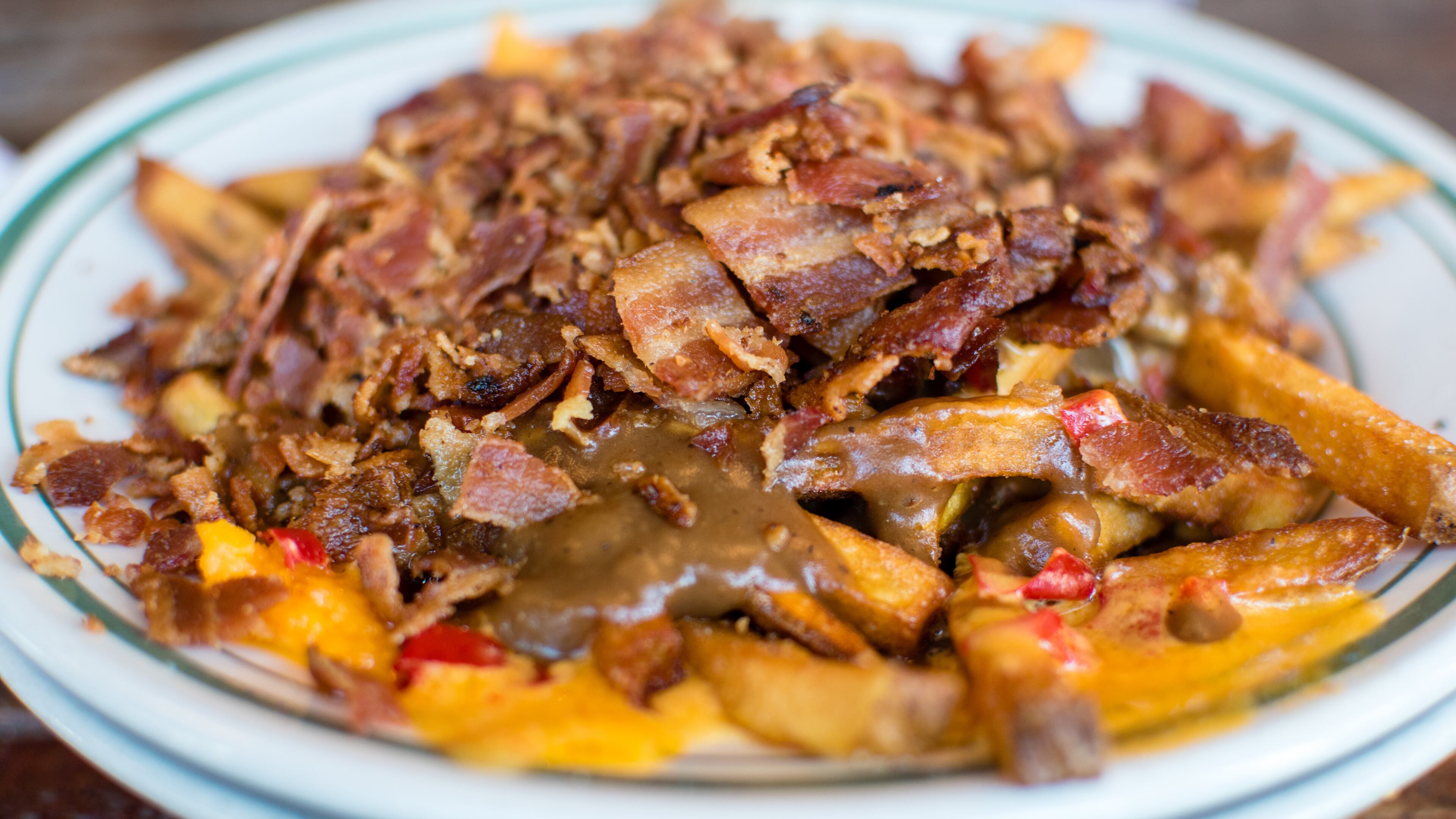 The Imperial in Oakhurst goes all in with their Poutine de Georgia, french fries topped with pimiento cheese, beef gravy and bacon. CONTRIBUTED BY HENRI HOLLIS