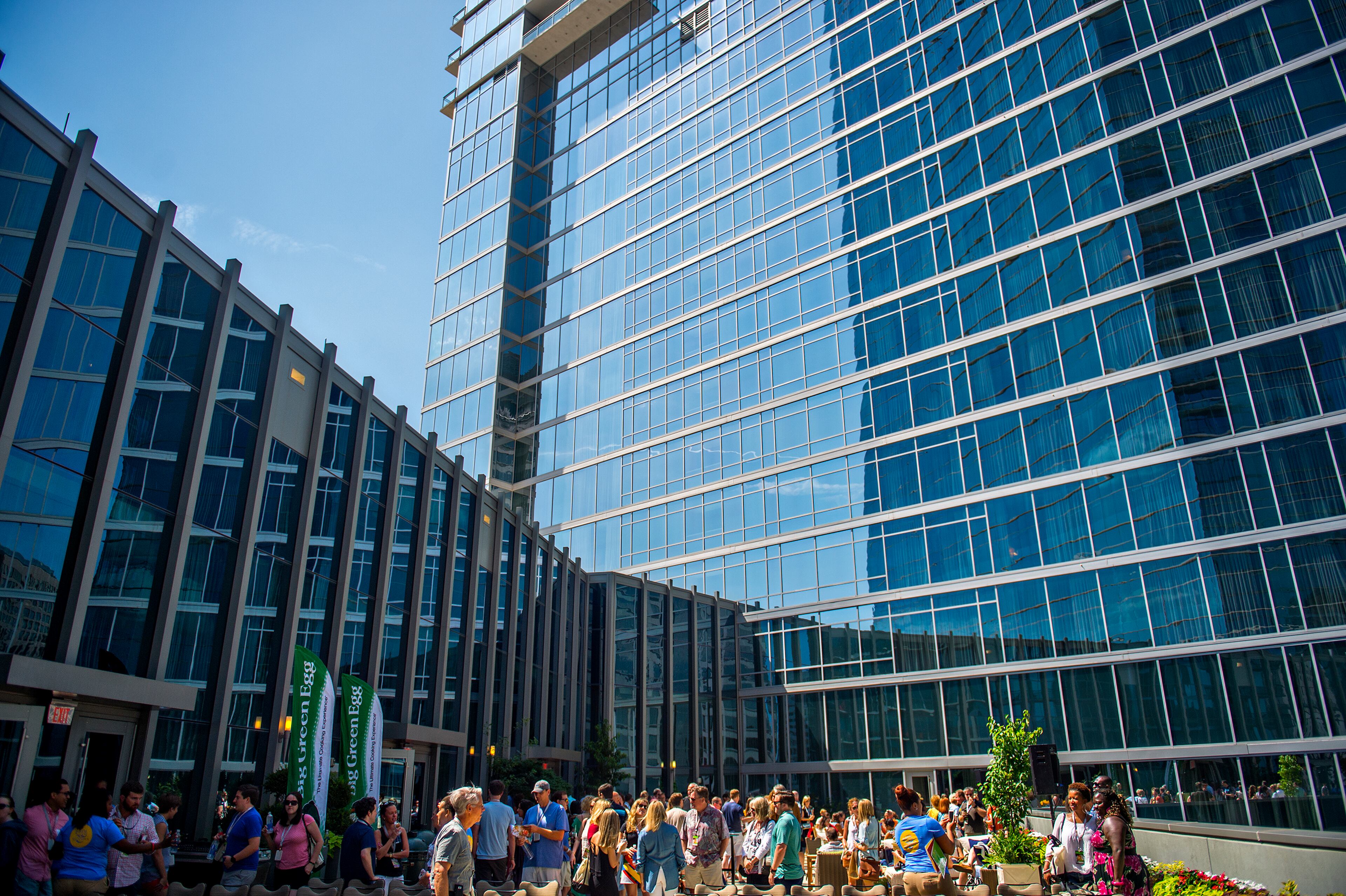 May 30, 2015 Atlanta - A crowd of people enjoy the sunshine outside on the balcony in between sessions during the Atlanta Food & Wine Festival at Loews Atlanta Hotel in Midtown on Saturday, May 30, 2015. Thousands of people tasted food and beverages prepared by chefs, brewers, distillers, wine makers and cocktail connoisseurs from all over the country. JONATHAN PHILLIPS / SPECIAL