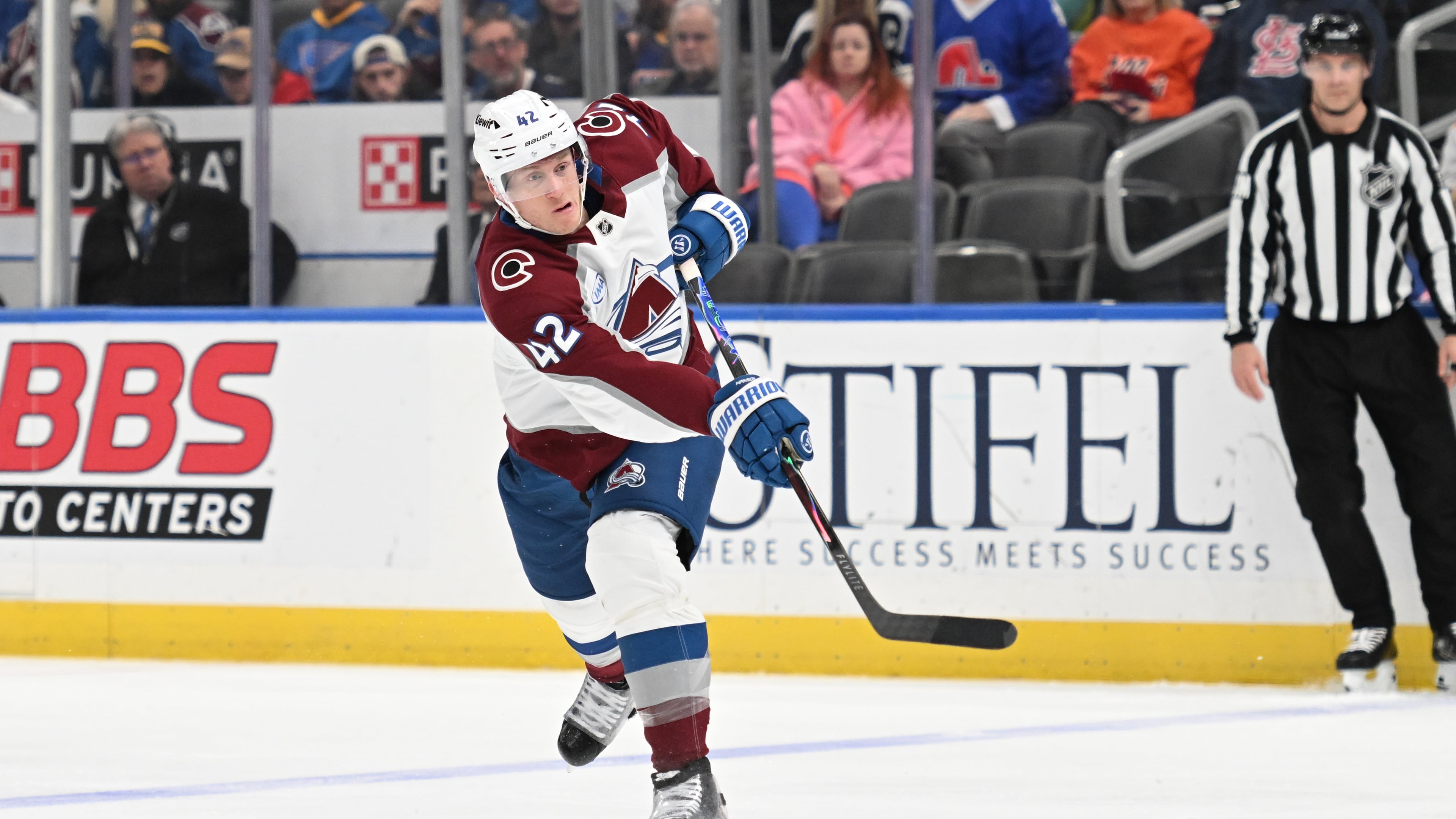 Colorado Avalanche's Josh Manson (42) takes a shot against the St. Louis Blues during the third period of an NHL hockey game, Tuesday, April 7, 2026, in St. Louis. (AP Photo/Joe Puetz)