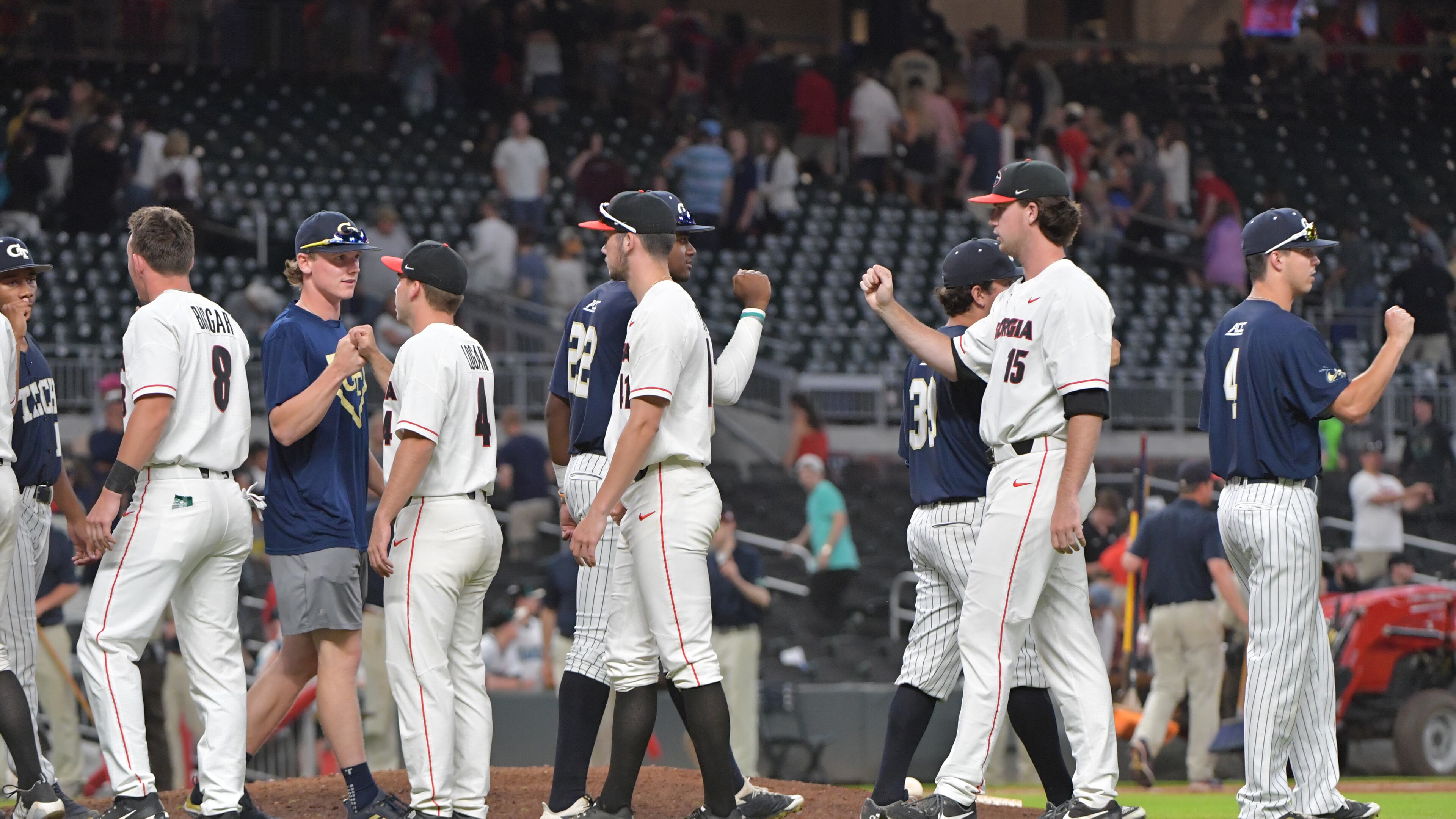 Georgia and Georgia Tech players come together after Georgia won 3-1 at SunTrust Park on May 8, 2018. HYOSUB SHIN / HSHIN@AJC.COM