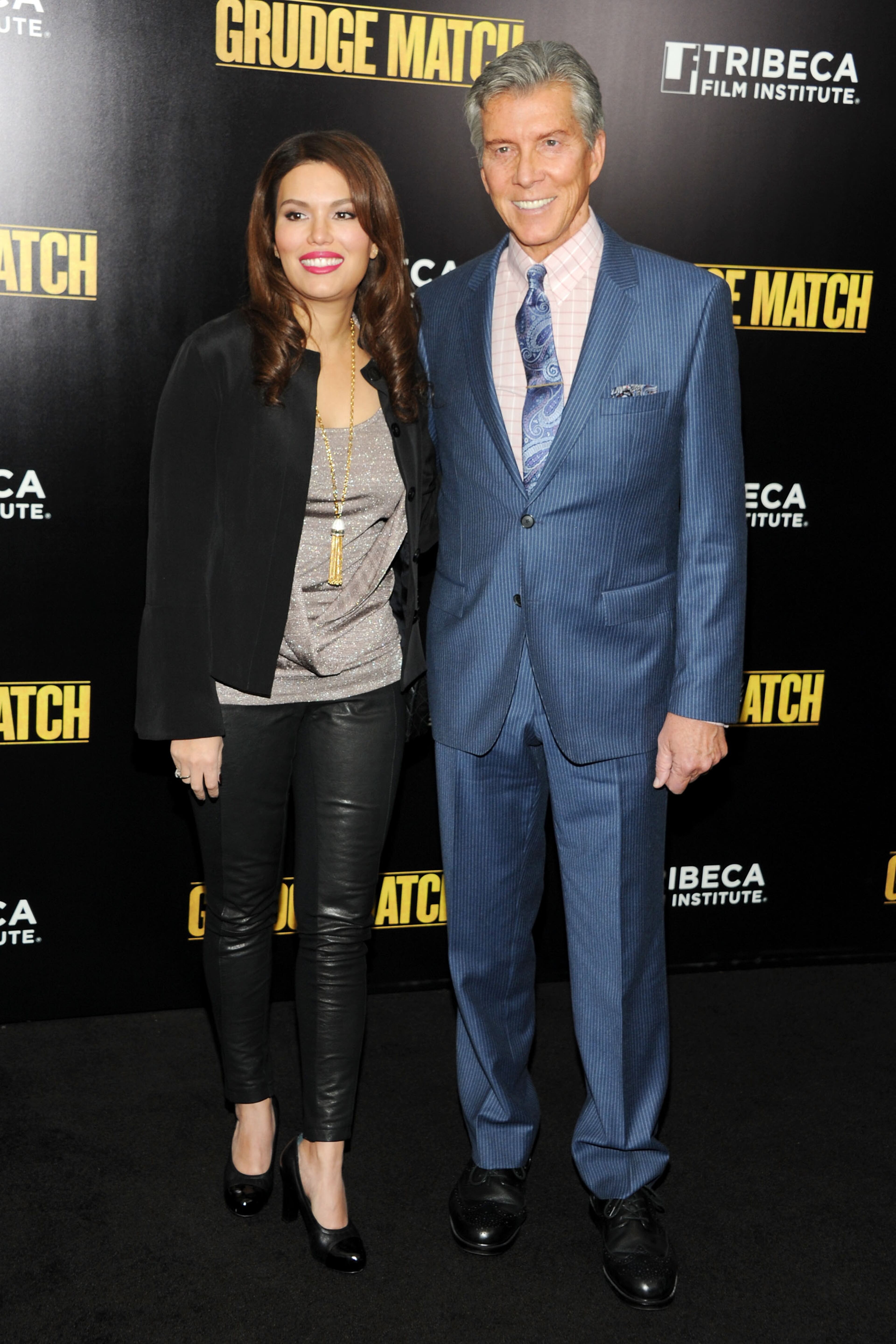 Christine Prado (L) and Michael Buffer attend the "Grudge Match" screening benefiting the Tribeca Film Insititute at Ziegfeld Theater on December 16, 2013 in New York City.